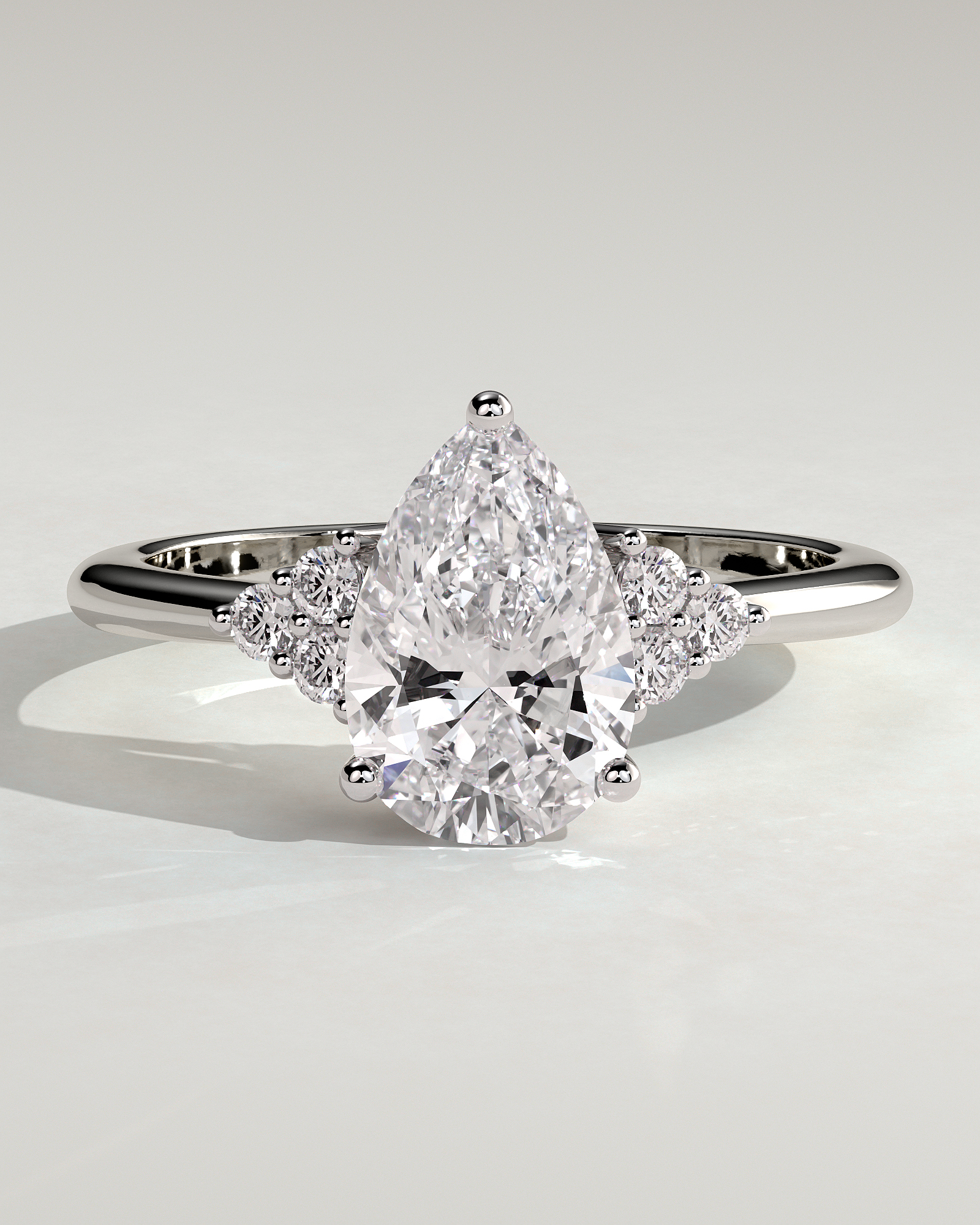 Brooke  3 Claw Pear Solitaire with Accent Stones - 18k White Gold