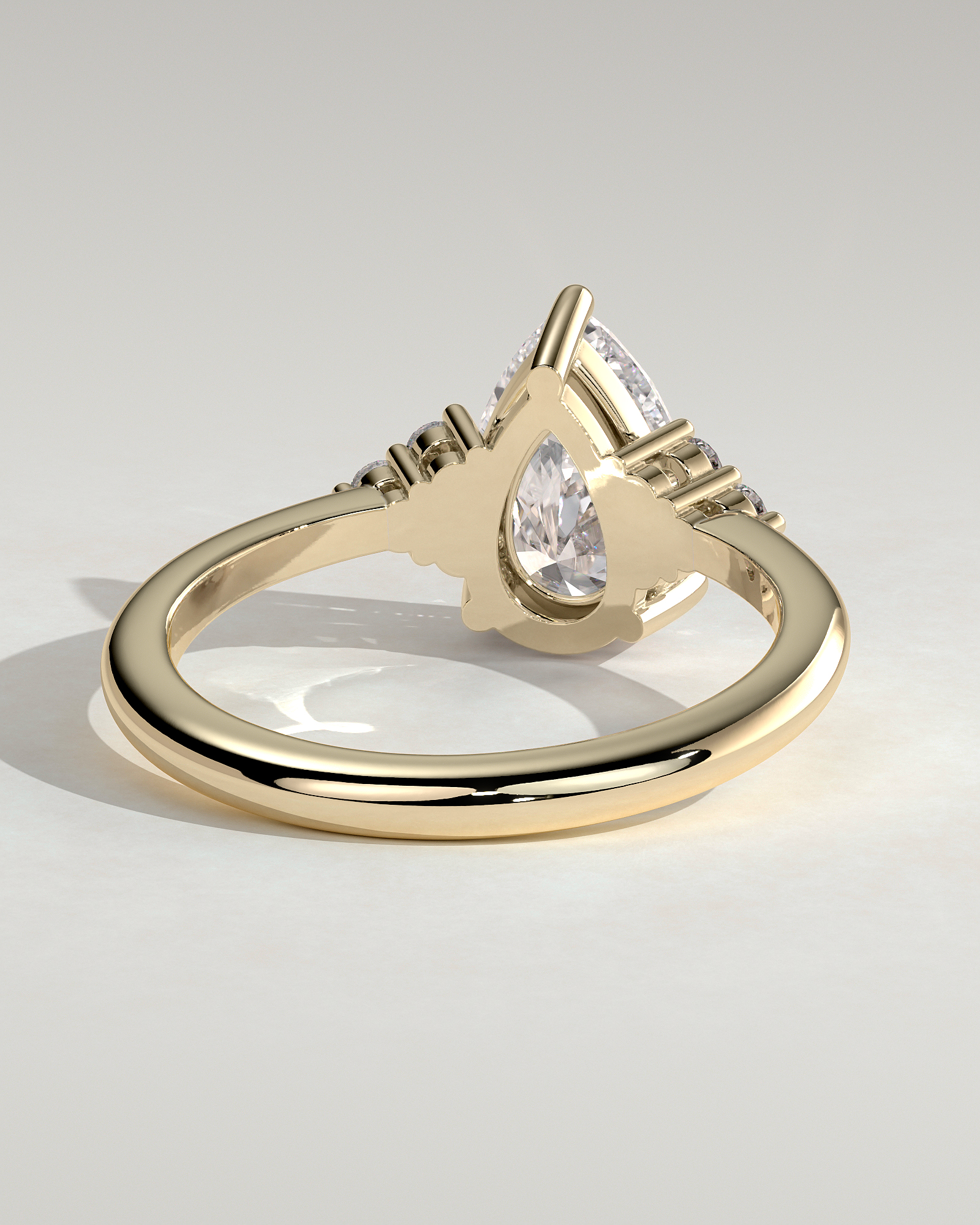 Brooke  3 Claw Pear Solitaire with Accent Stones - 18k Yellow Gold