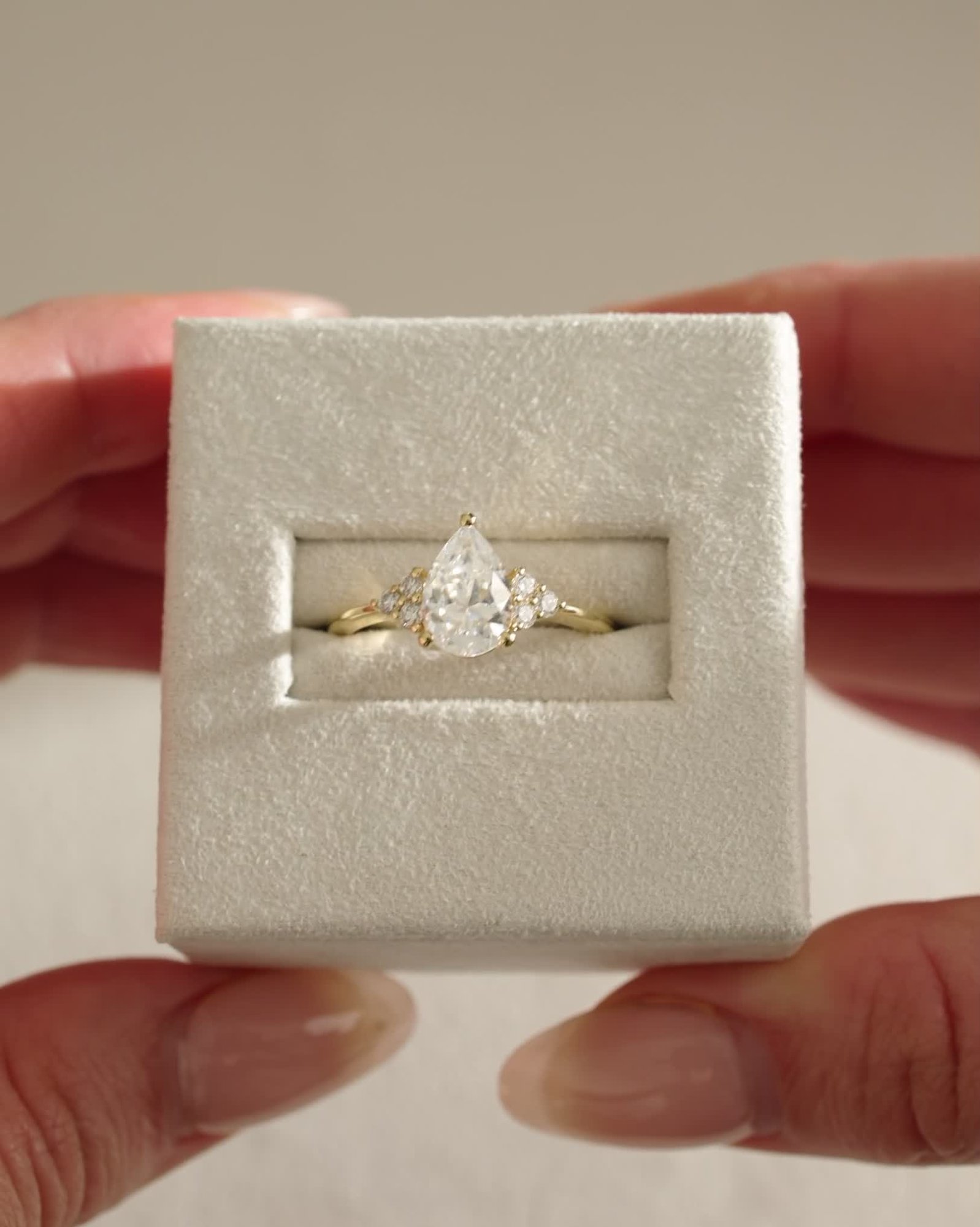 Brooke  3 Claw Pear Solitaire with Accent Stones Lifestyle Image