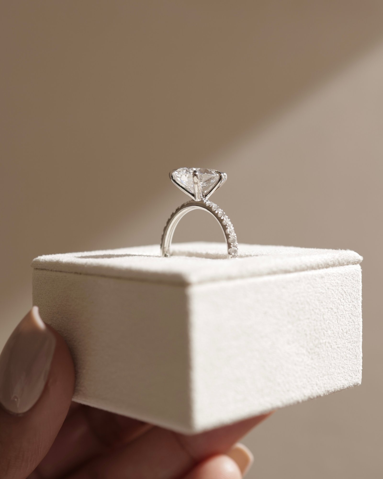 Brynlee - 5 Claw Pear Solitaire with 2/3 Pave Band Lifestyle Image