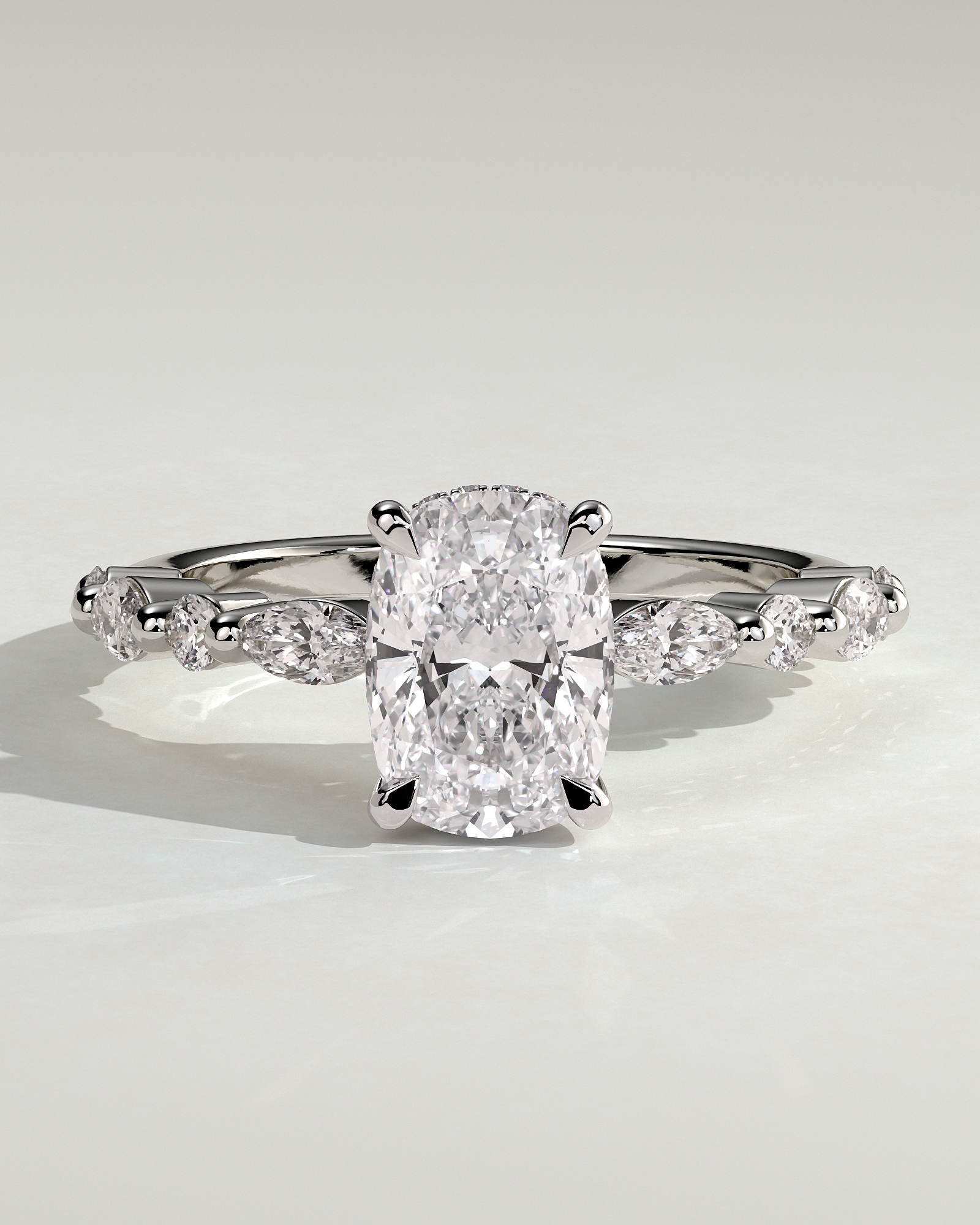 Cali - 4 Claw Elongated Cushion Solitaire with Accent Stones - 18k White Gold