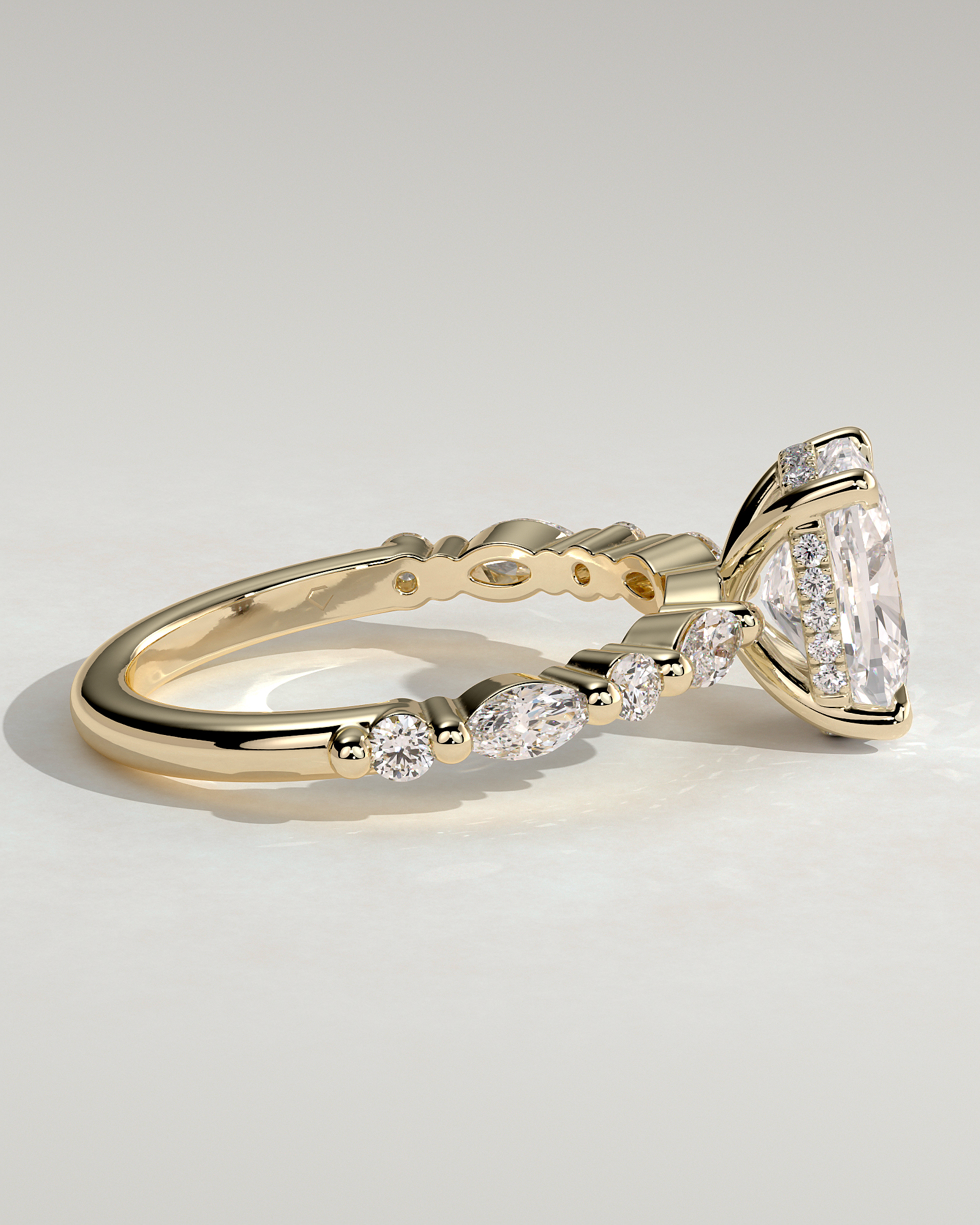 Cali - 4 Claw Elongated Cushion Solitaire with Accent Stones - 18k Yellow Gold