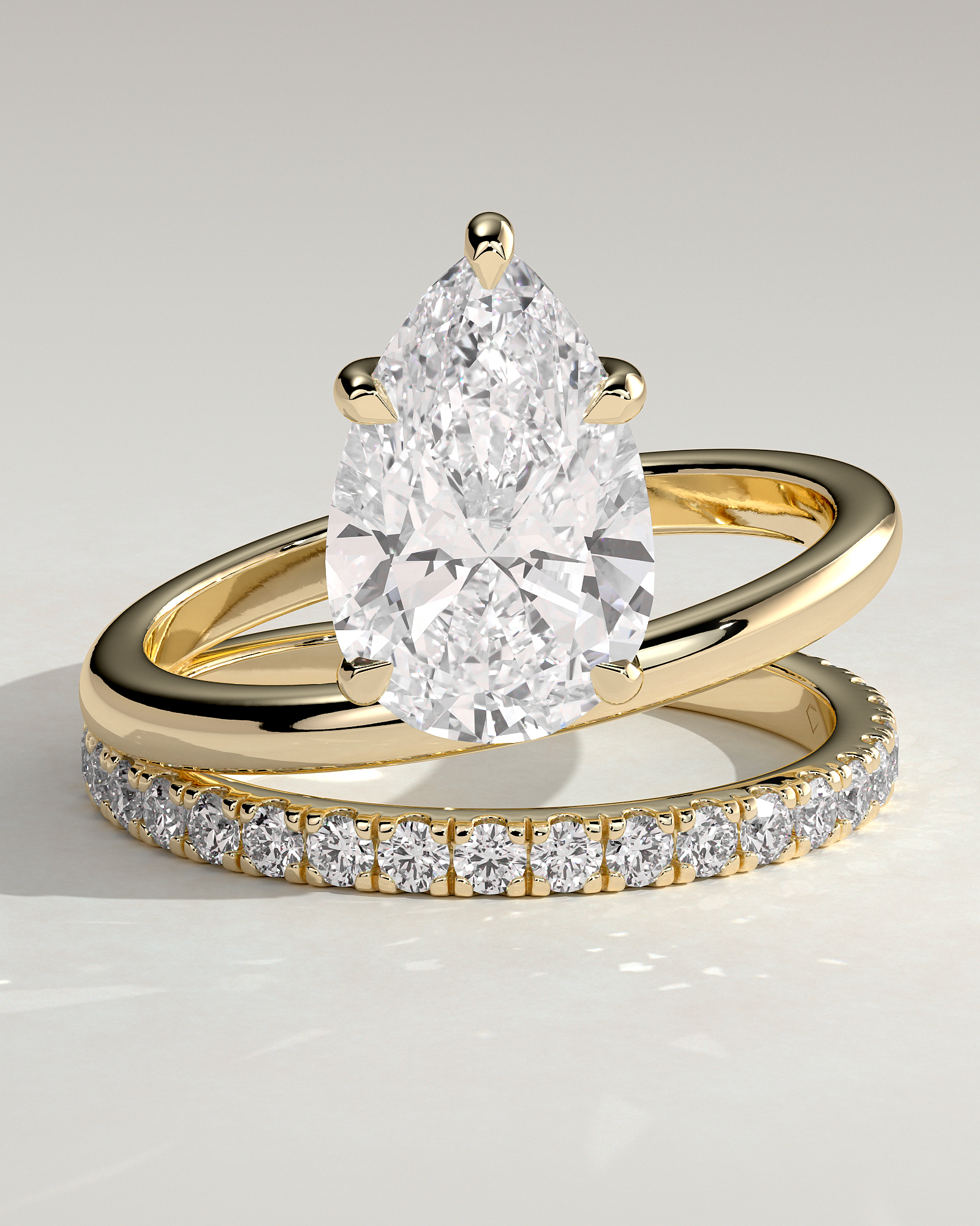 Candice - Double Band Pear Solitaire - 18k Yellow Gold