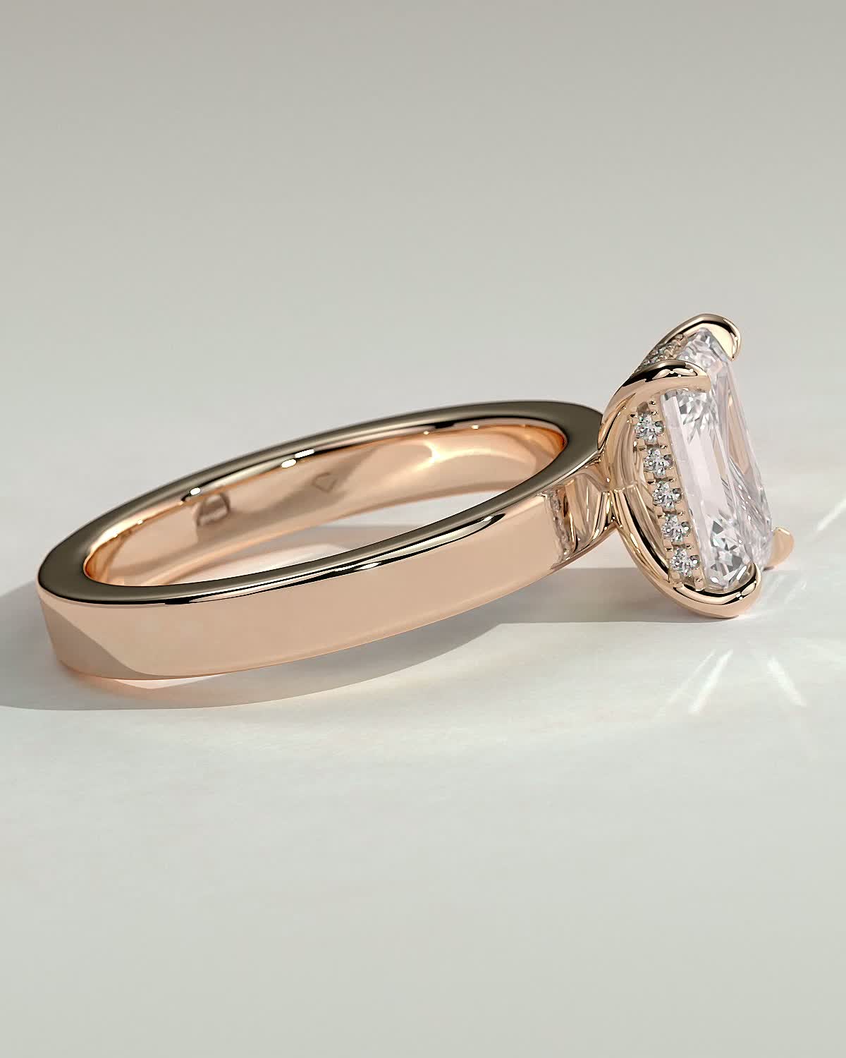 Carmella - Emerald 4 Claw Solitaire with Flat Cigar Band and Hidden Halo Engagement Ring - 18k Rose Gold High Setting