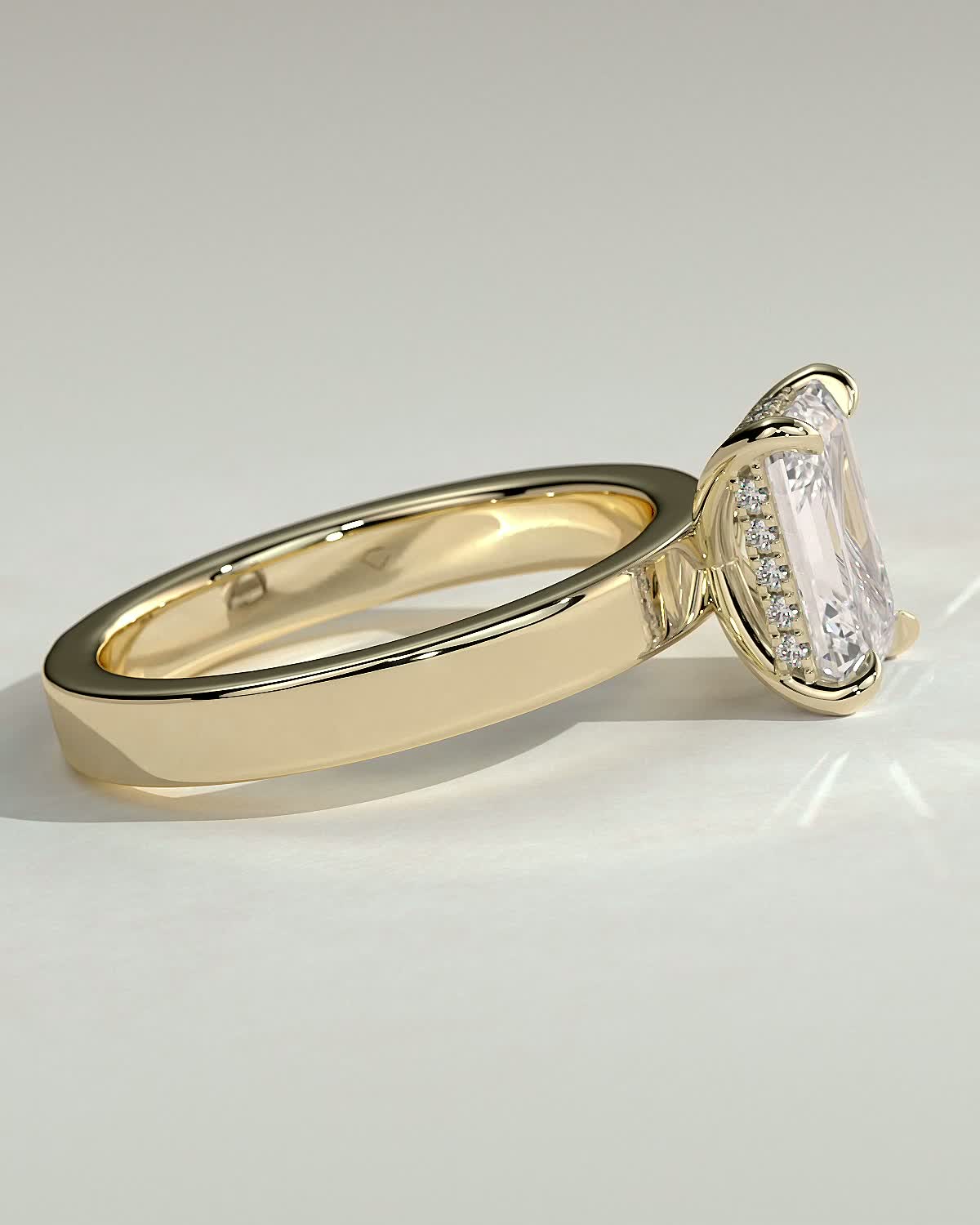 Carmella - Emerald 4 Claw Solitaire with Flat Cigar Band and Hidden Halo Engagement Ring - 18k Yellow Gold High Setting