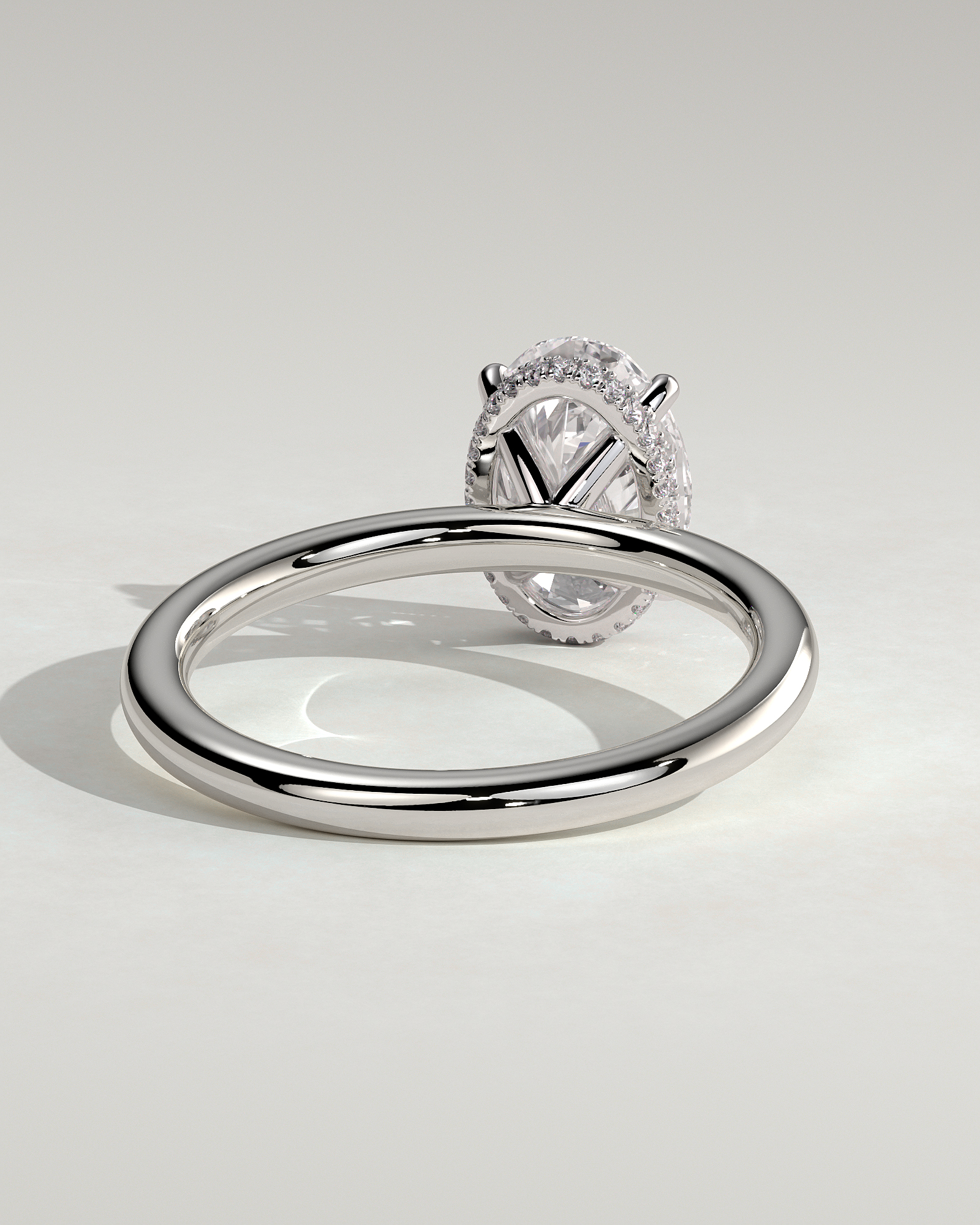 Cecilia - Oval Solitaire with Wrap Around Hidden Halo - 18k White Gold