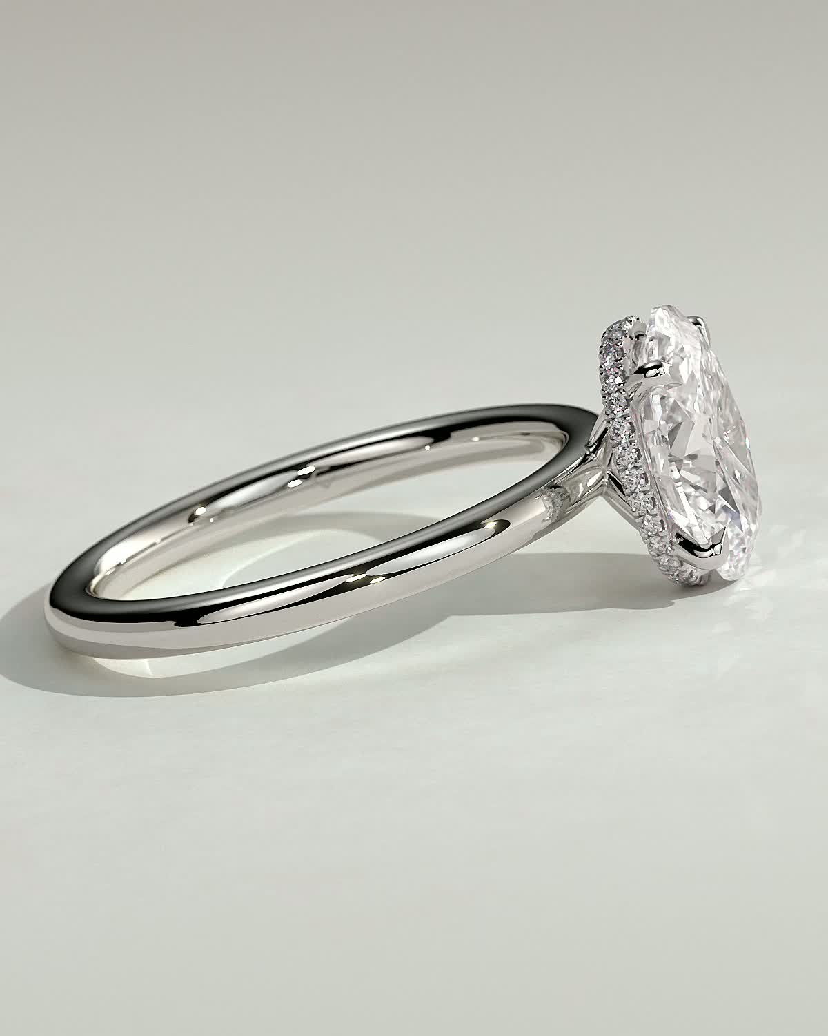 Cecilia - Oval Solitaire with Wrap Around Hidden Halo - 18k White Gold