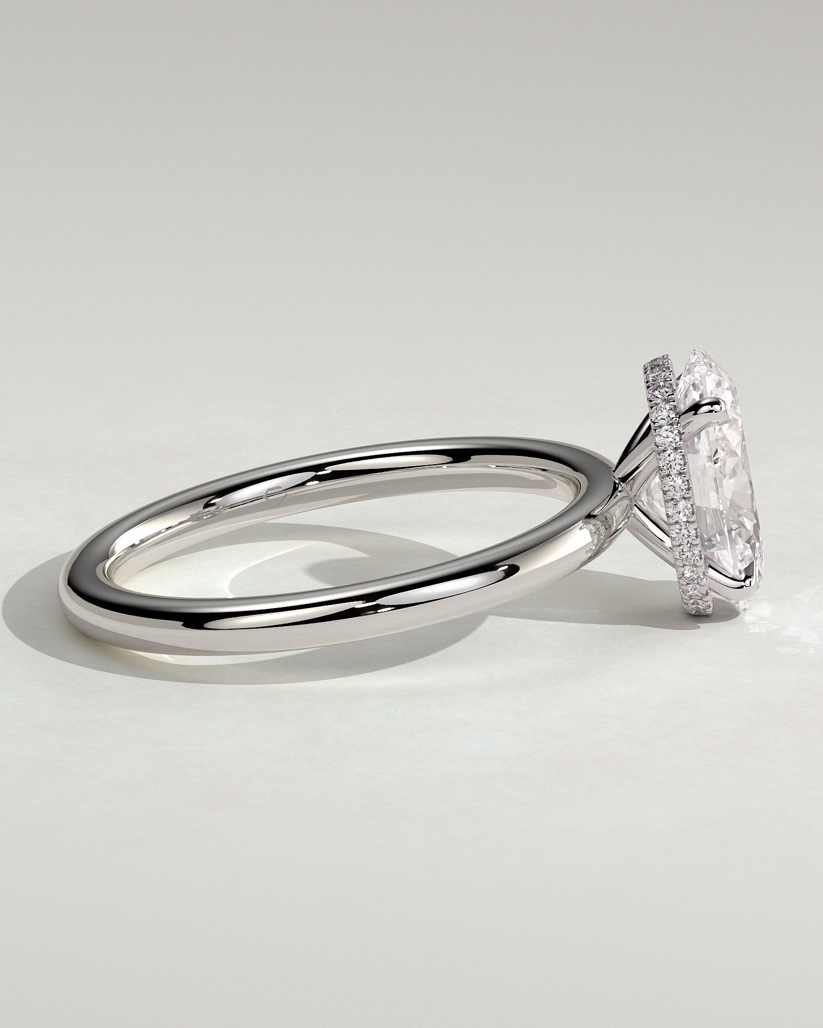 Cecilia - Oval Solitaire with Wrap Around Hidden Halo - 18k White Gold
