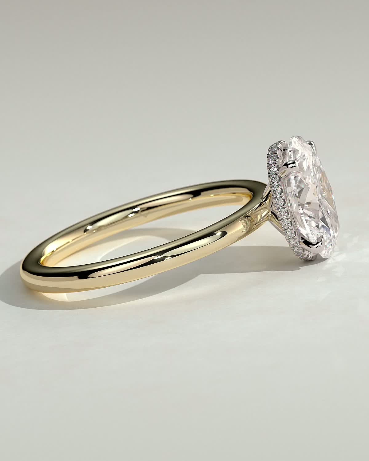 Cecilia - Oval Solitaire with Wrap Around Hidden Halo - 18k Yellow Gold / 18k White Gold