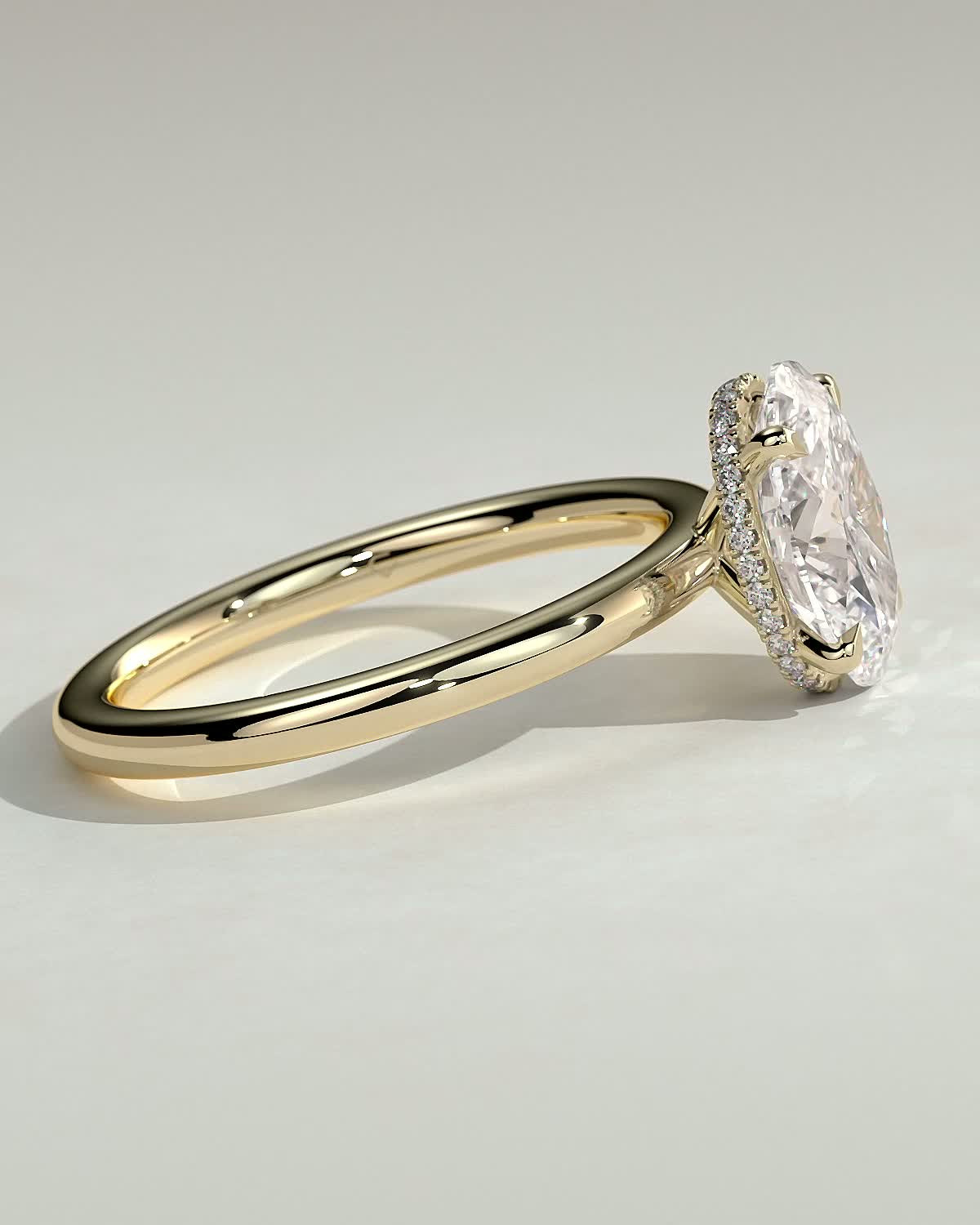 Cecilia - Oval Solitaire with Wrap Around Hidden Halo - 18k Yellow Gold