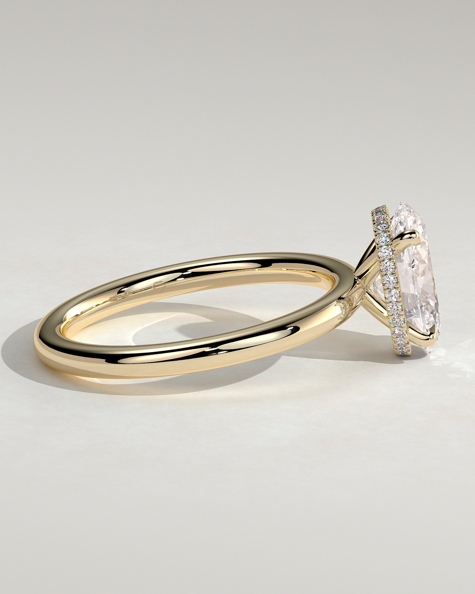 Cecilia - Oval Solitaire with Wrap Around Hidden Halo - 18k Yellow Gold