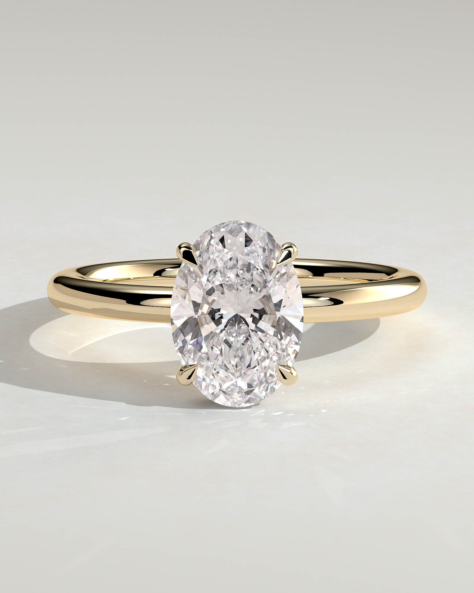 Cecilia - Oval Solitaire with Wrap Around Hidden Halo - 18k Yellow Gold