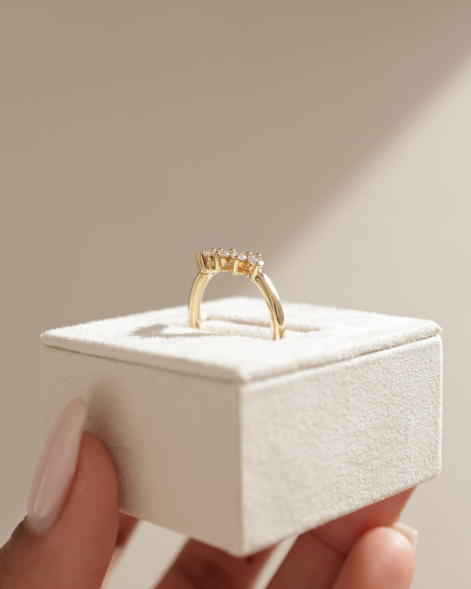 Celeste  Round Cut Curved Wedding Ring Lifestyle Image