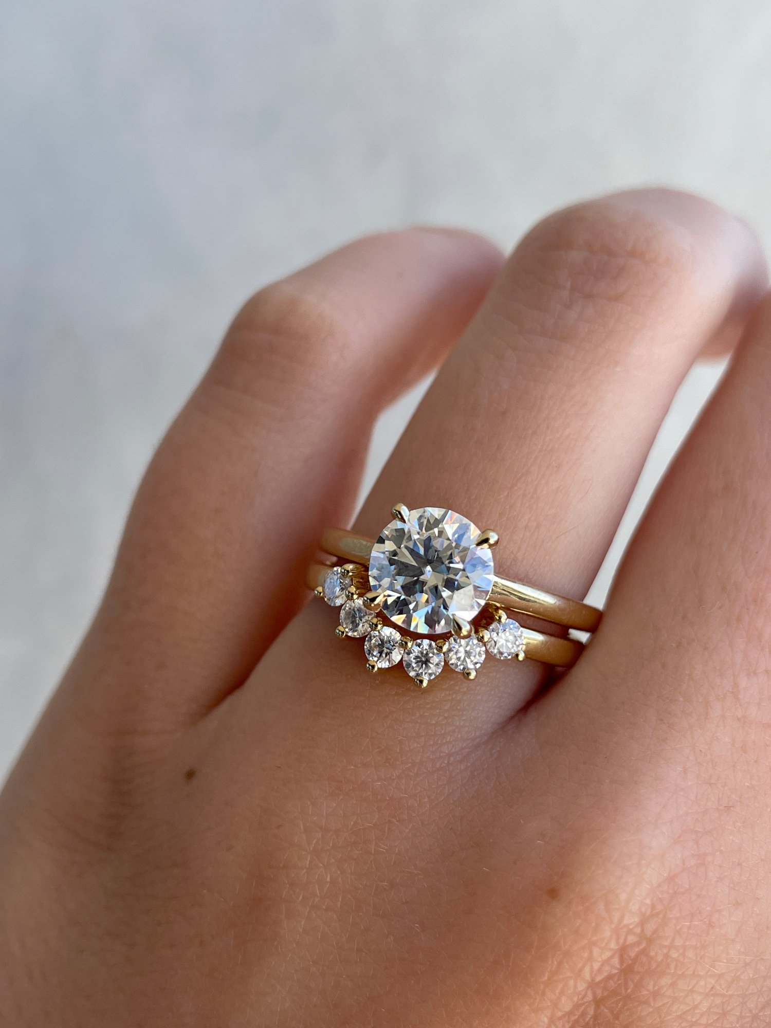 Celeste  Round Cut Curved Wedding Ring Lifestyle Image