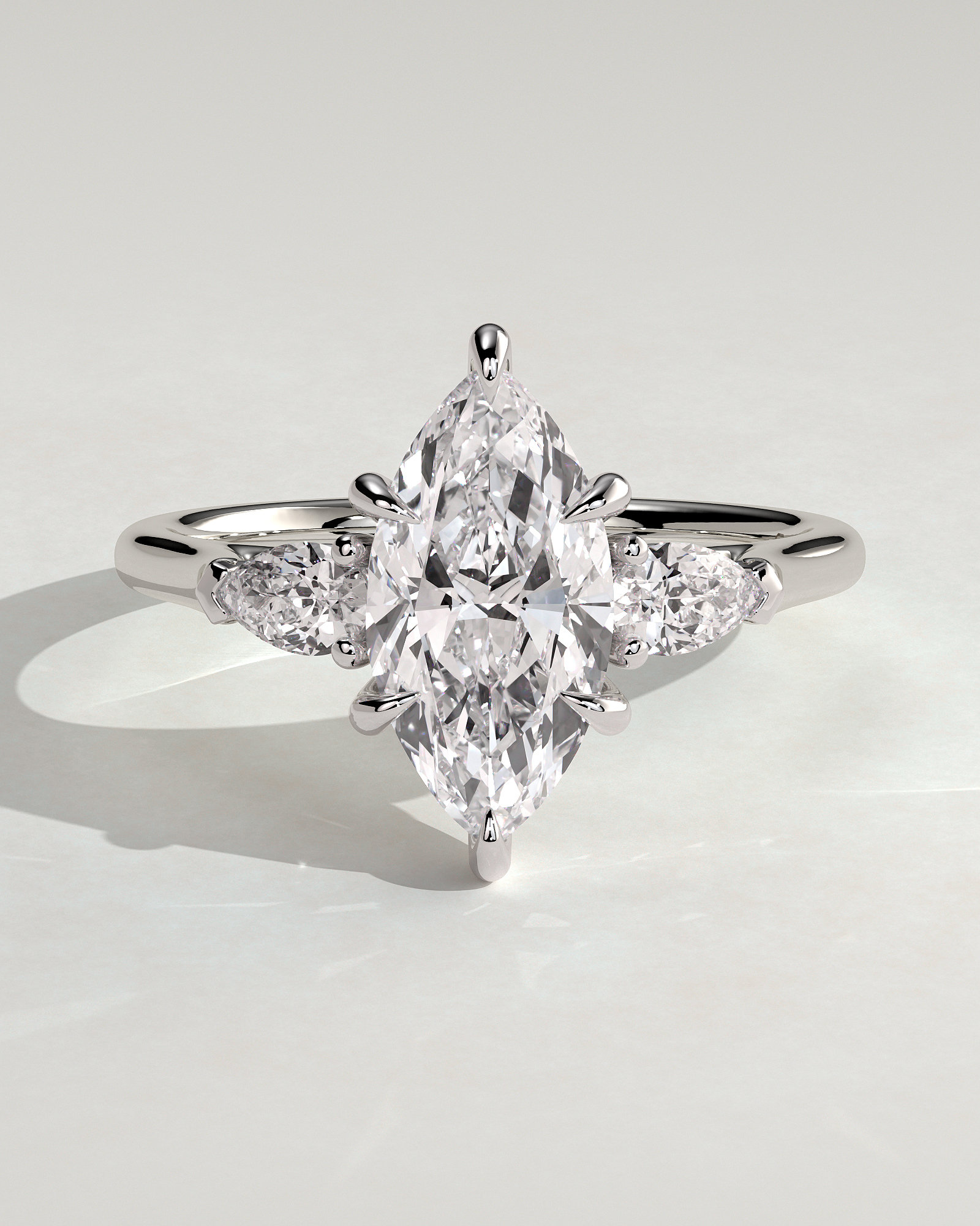 Marquise 6 Claw Trilogy with Pear Side Stones Engagement Ring - 18k White Gold