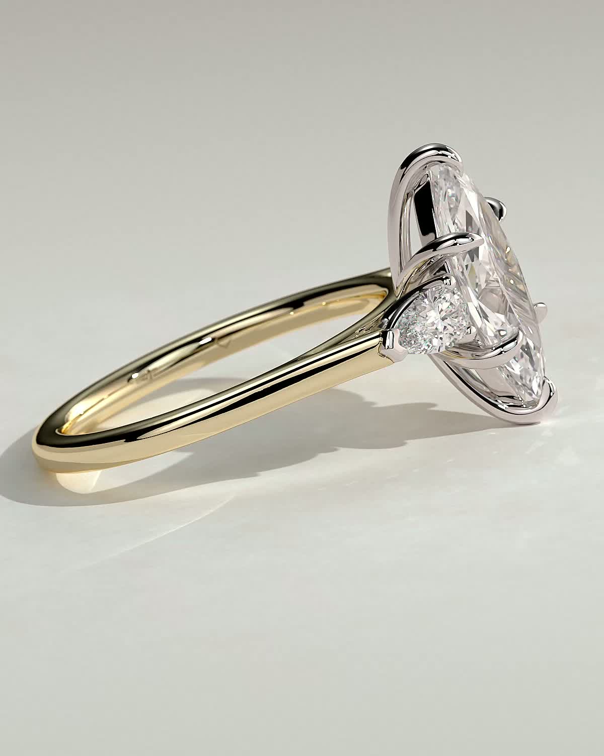 Marquise 6 Claw Trilogy with Pear Side Stones Engagement Ring - 18k Yellow Gold / 18k White Gold