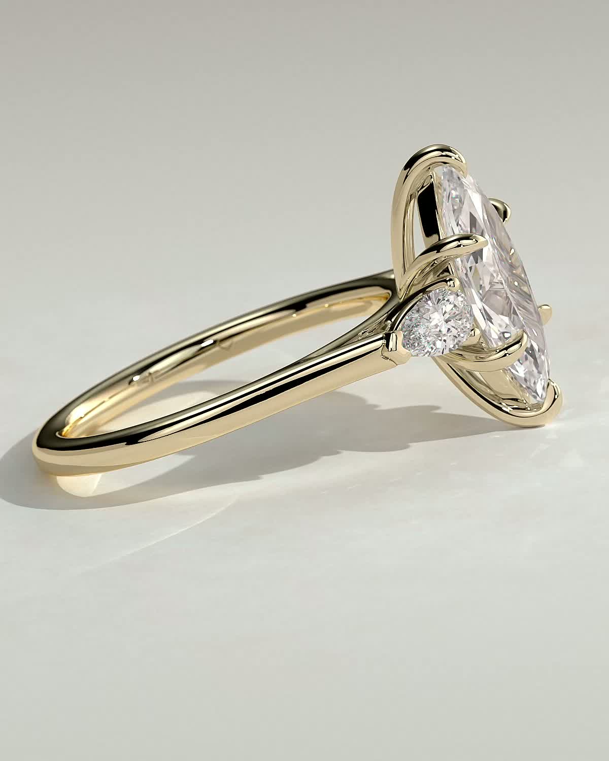 Marquise 6 Claw Trilogy with Pear Side Stones Engagement Ring - 18k Yellow Gold