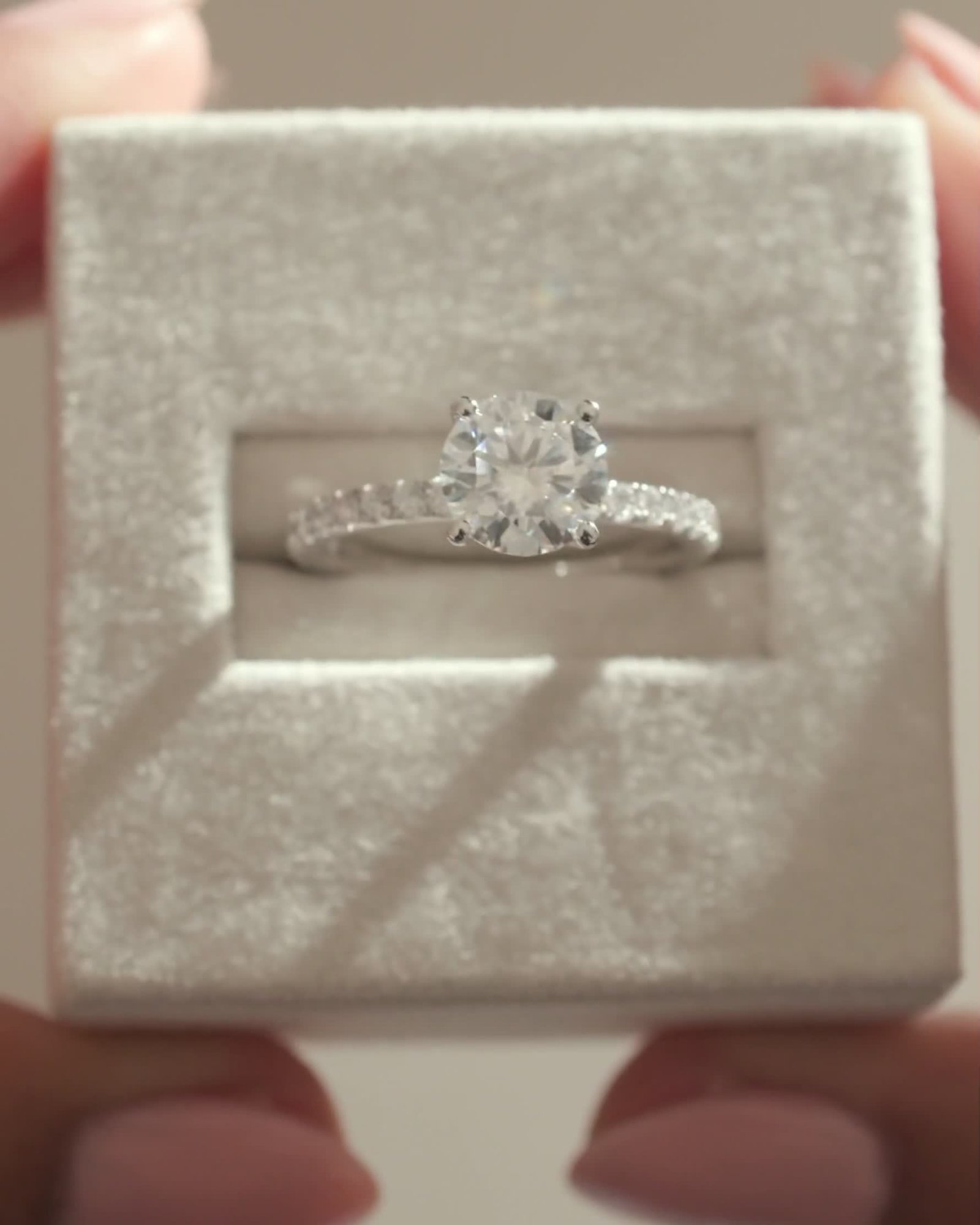 Charlie - 4 Claw Pav Round Solitaire with Hidden Halo Lifestyle Image