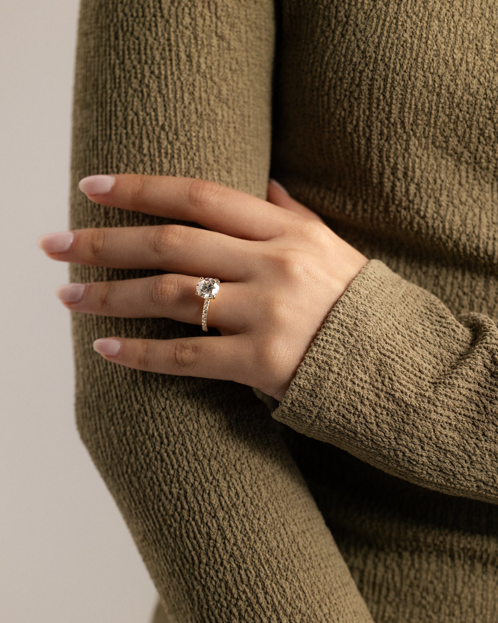 Charlie - 4 Claw Pav Round Solitaire with Hidden Halo Lifestyle Image