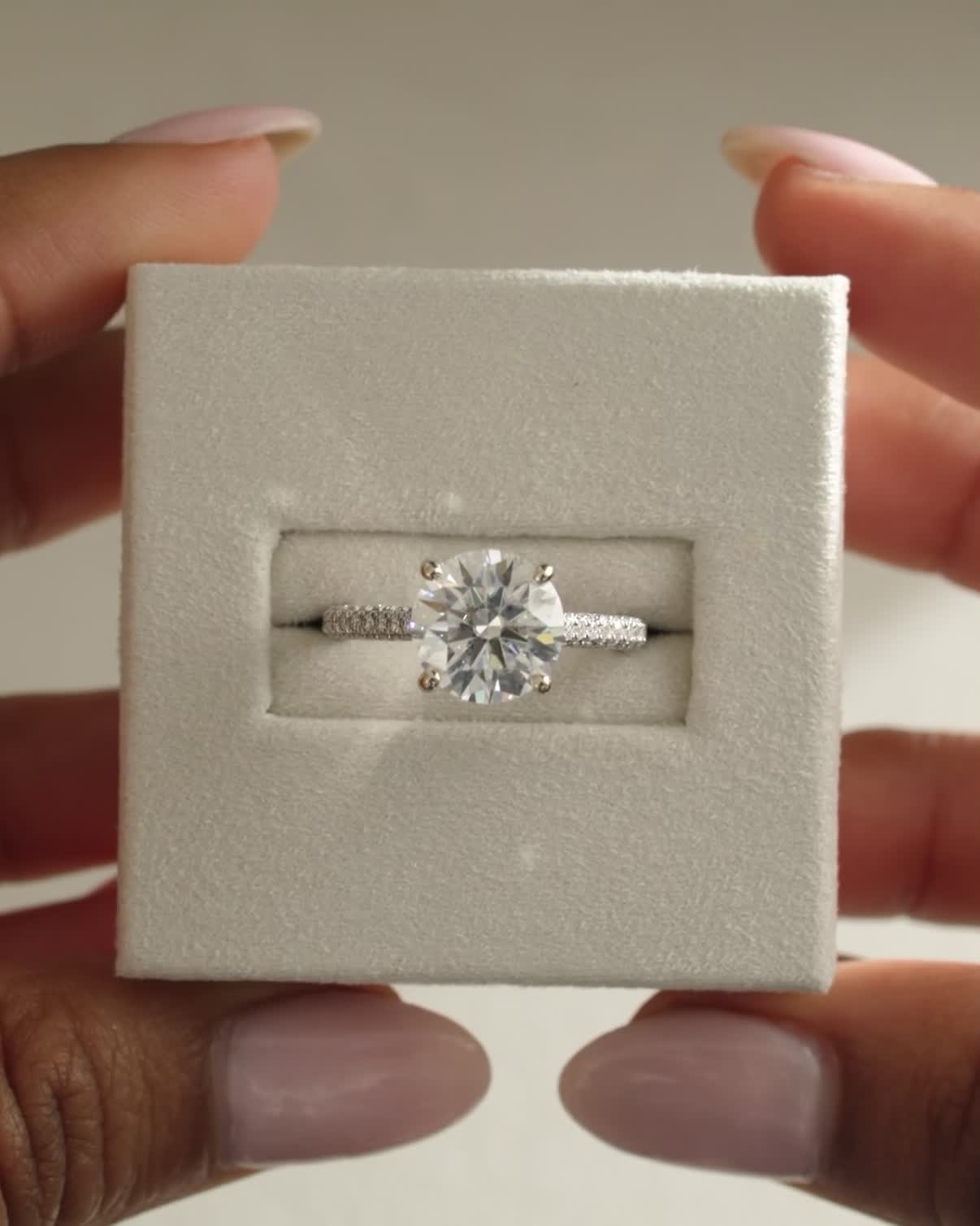 Chelsea  4 Claw Triple Pav Cathedral Round Solitaire Lifestyle Image