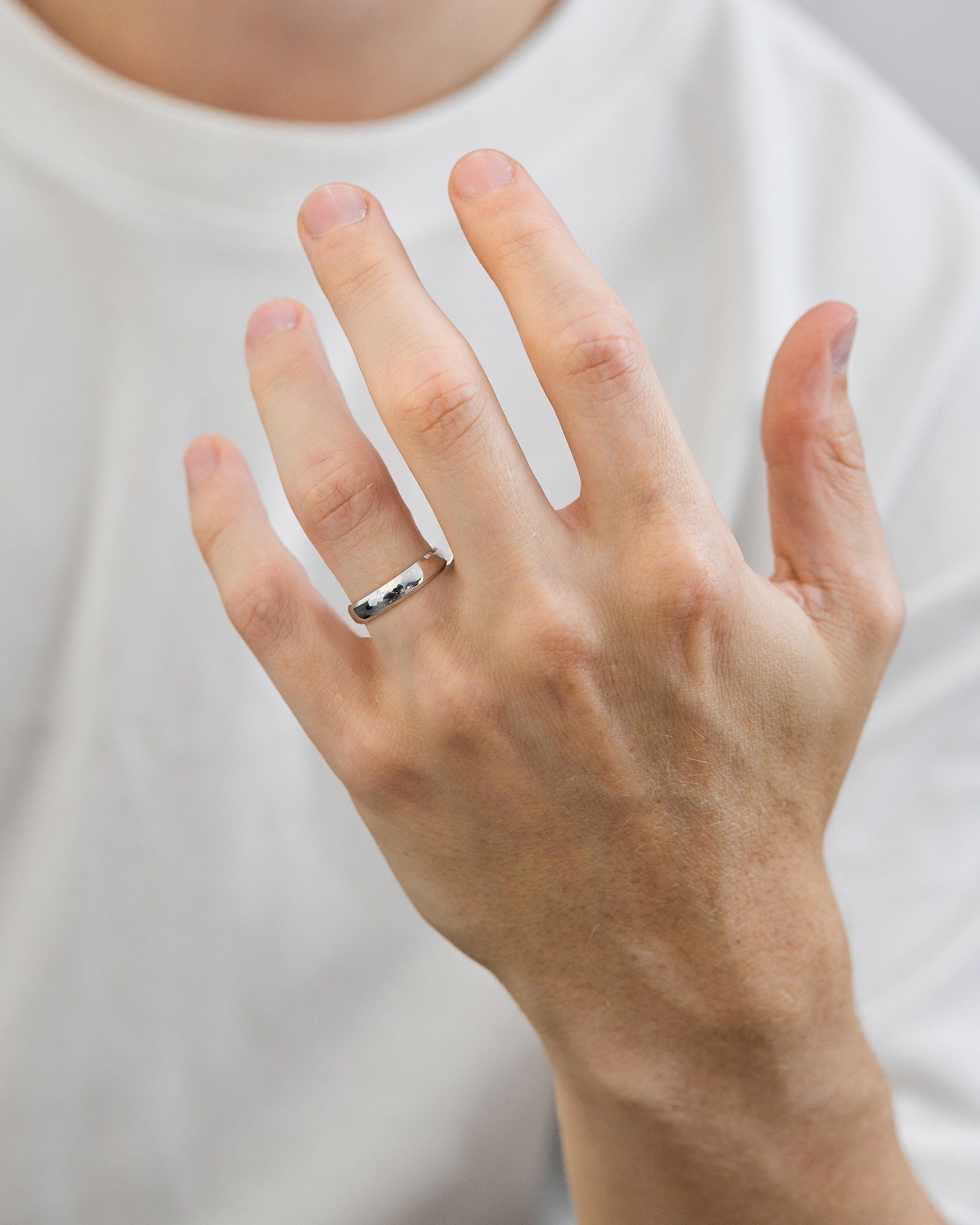 Classic Round Bevel Mens Wedding Ring Lifestyle Image