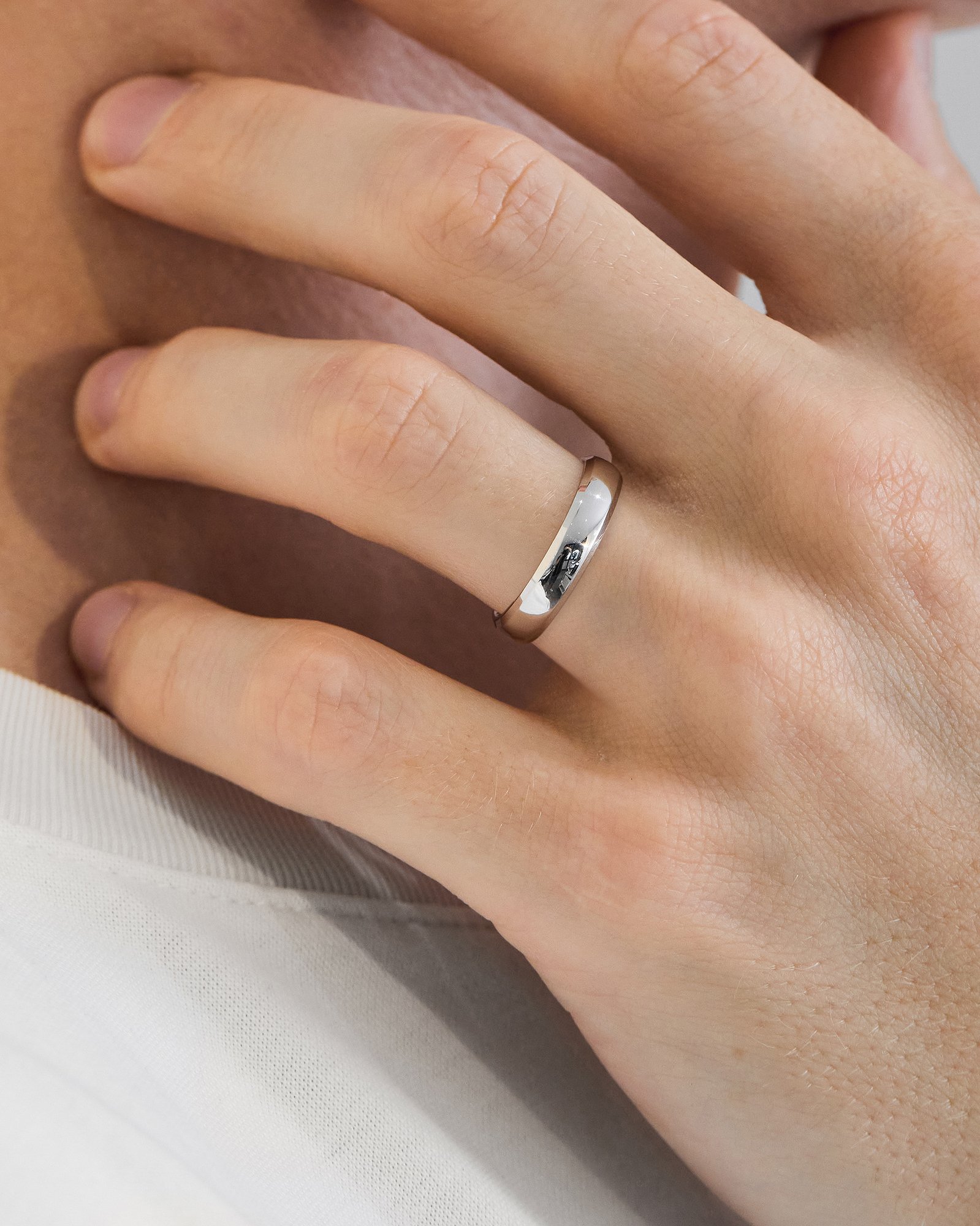 Classic Round Bevel Mens Wedding Ring Lifestyle Image