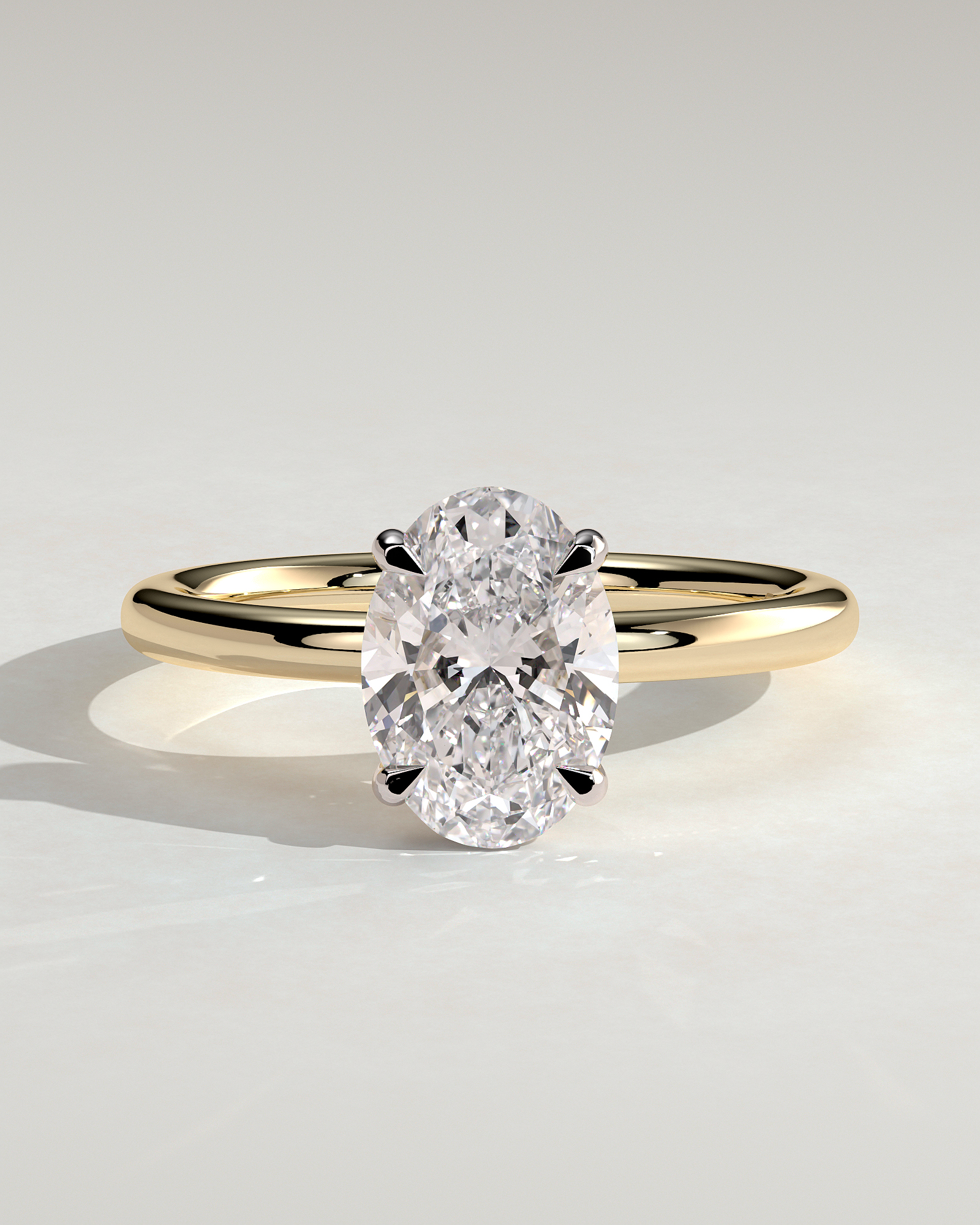 Daisy - Classic Oval 4 Claw Solitaire Engagement Ring - 18k Yellow Gold / 18k White Gold High Setting