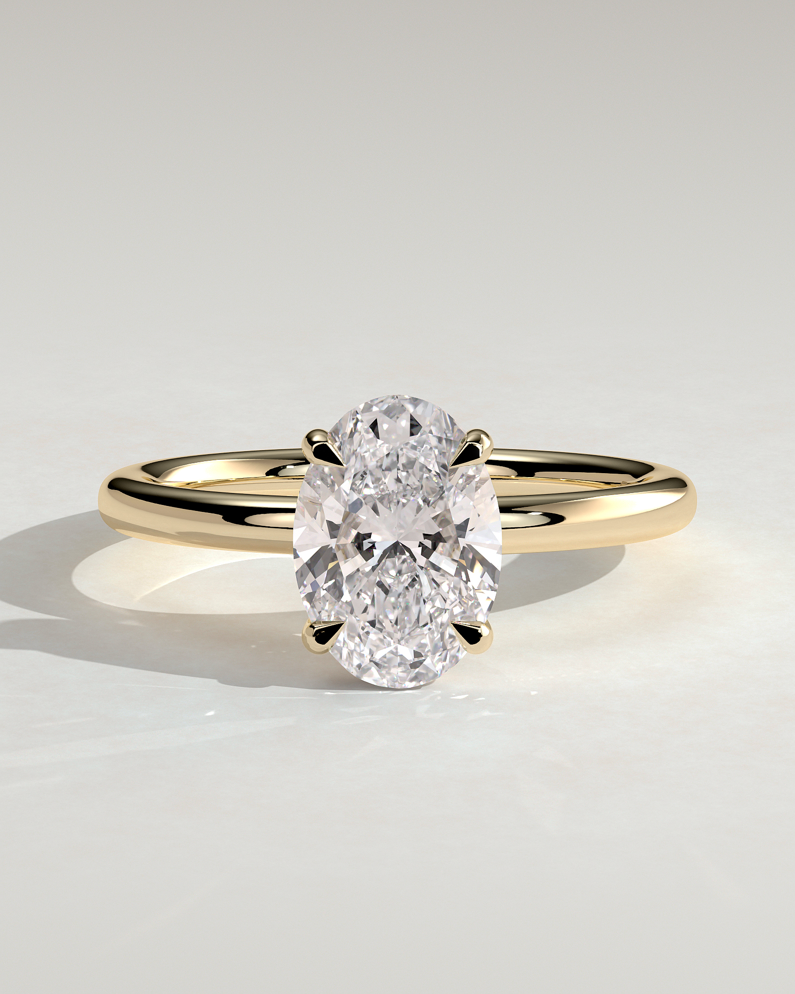 Daisy  Oval Solitaire - 18k Yellow Gold High Setting