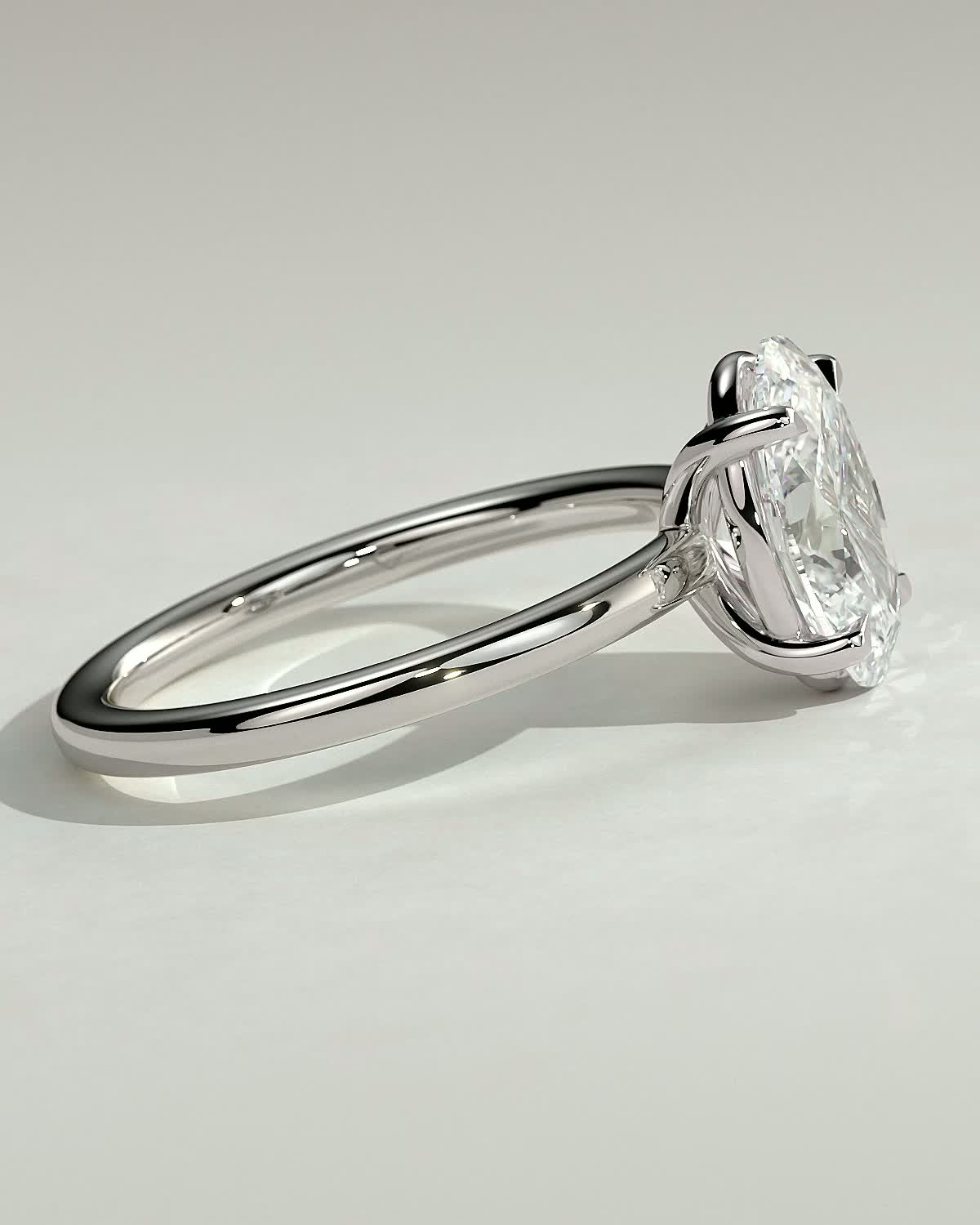 Daisy  Oval Solitaire - 18k White Gold Low Setting