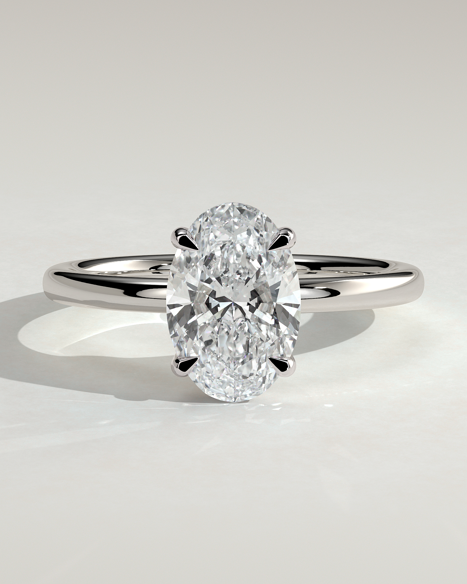 Daisy  Oval Solitaire - 18k White Gold Low Setting