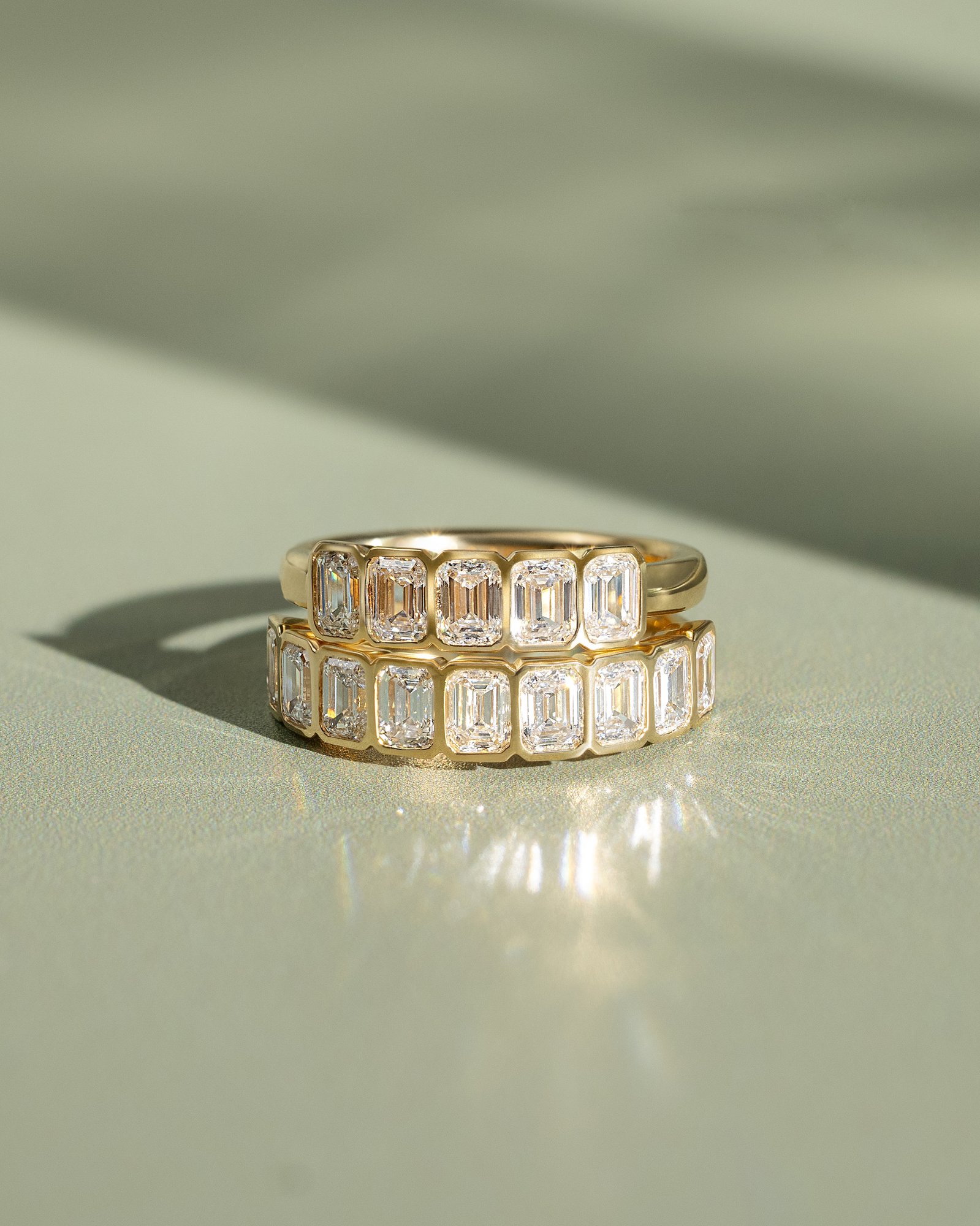 Dallas - Bezel Set Emerald Wedding Ring Lifestyle Image