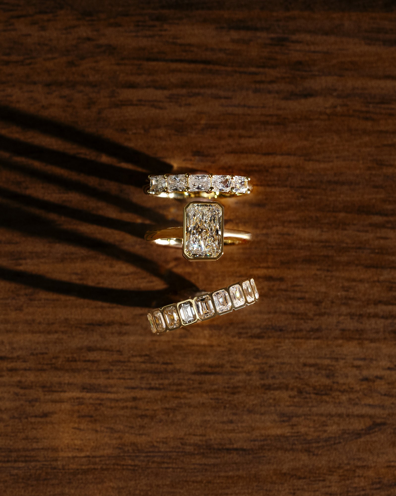 Dallas - Bezel Set Emerald Wedding Ring Lifestyle Image