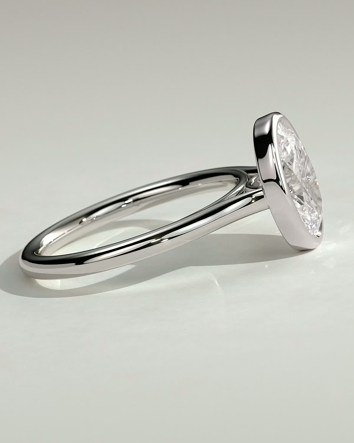Daphne - Oval Solitaire with Cathedral Bezel Setting - 18k White Gold