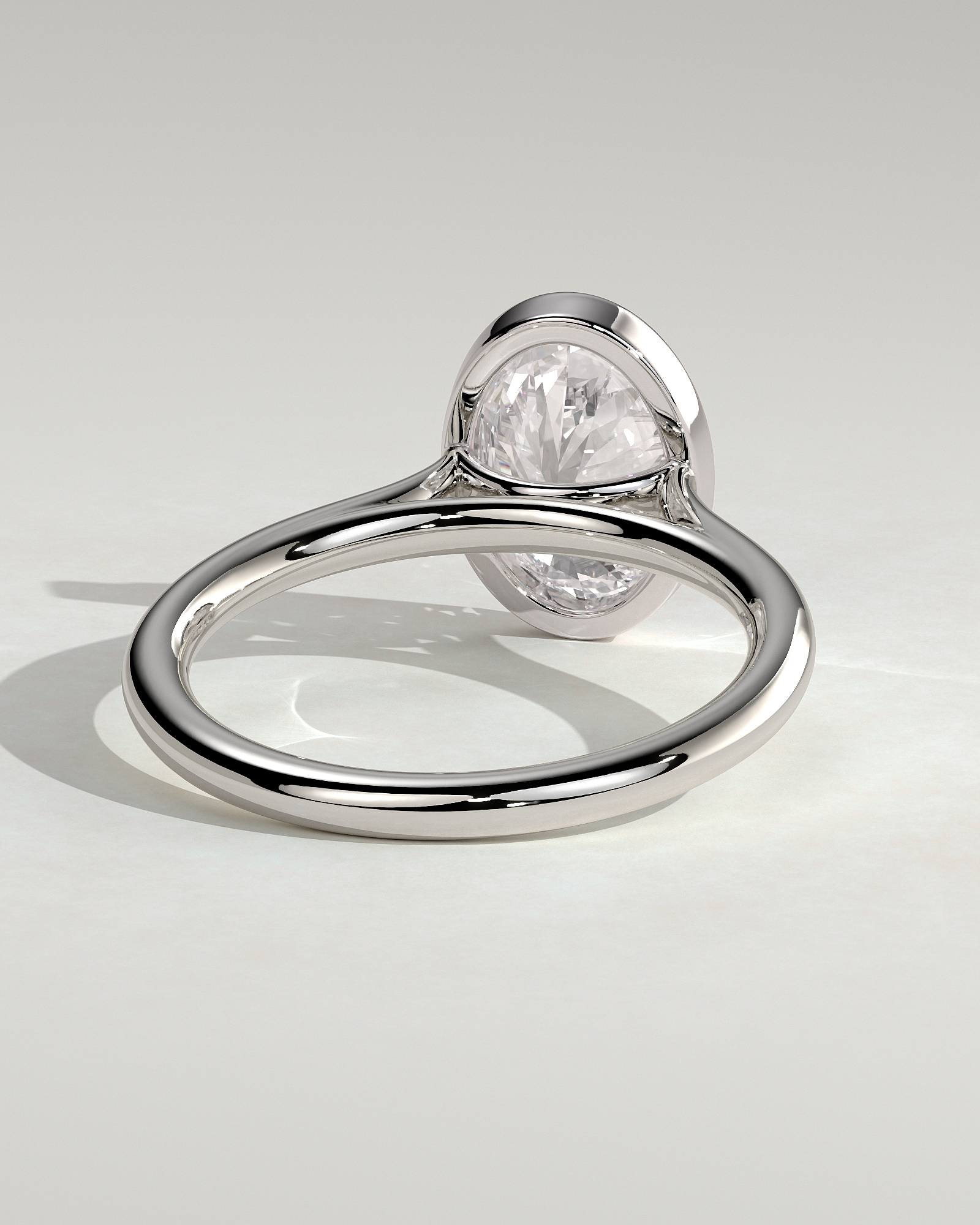 Daphne - Oval Solitaire with Cathedral Bezel Setting - 18k White Gold