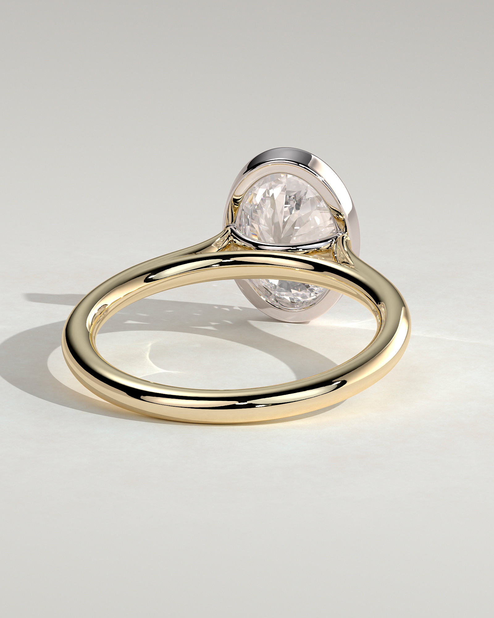 Daphne - Oval Solitaire with Cathedral Bezel Setting - 18k Yellow Gold / 18k White Gold