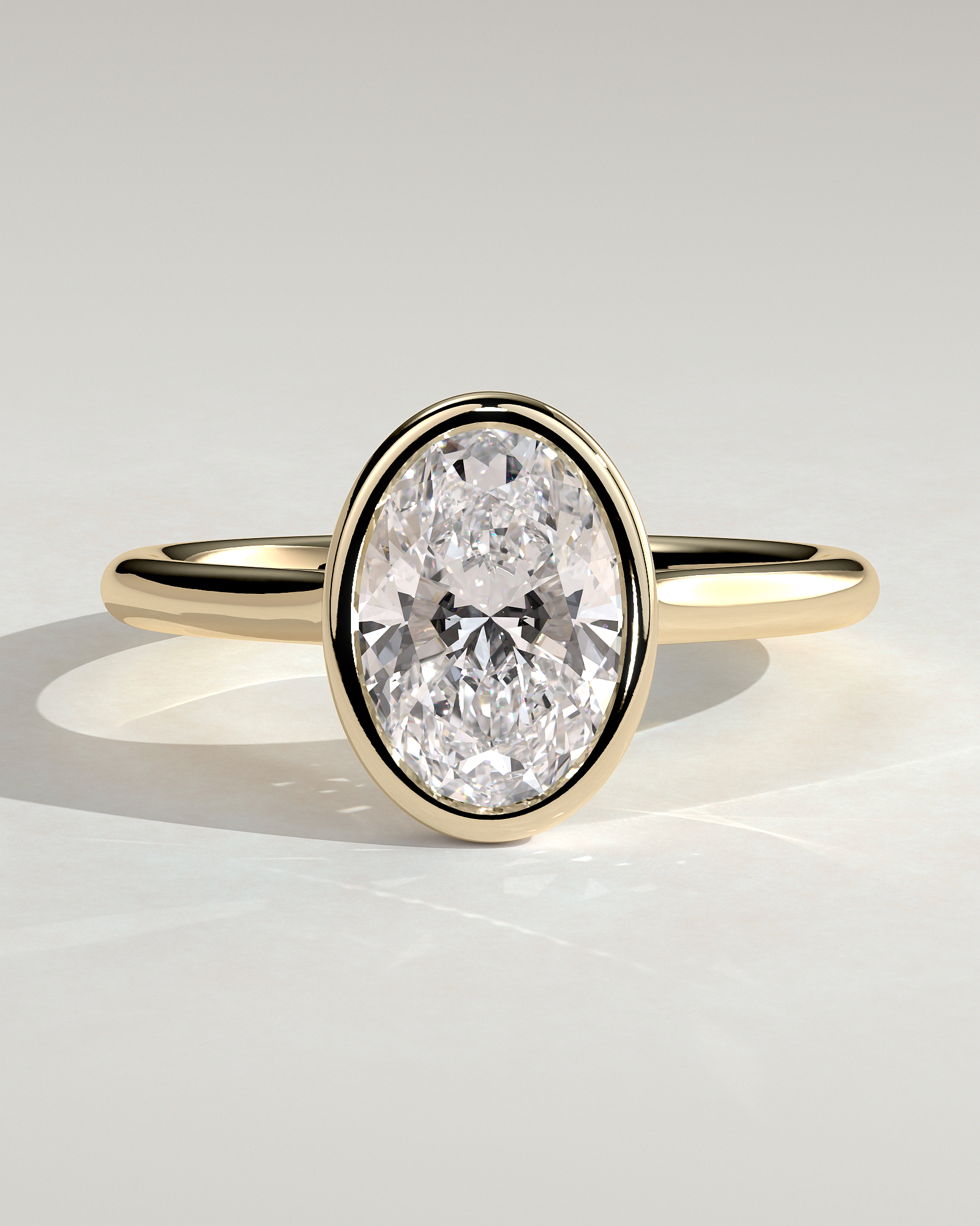Daphne - Oval Solitaire with Cathedral Bezel Setting - 18k Yellow Gold