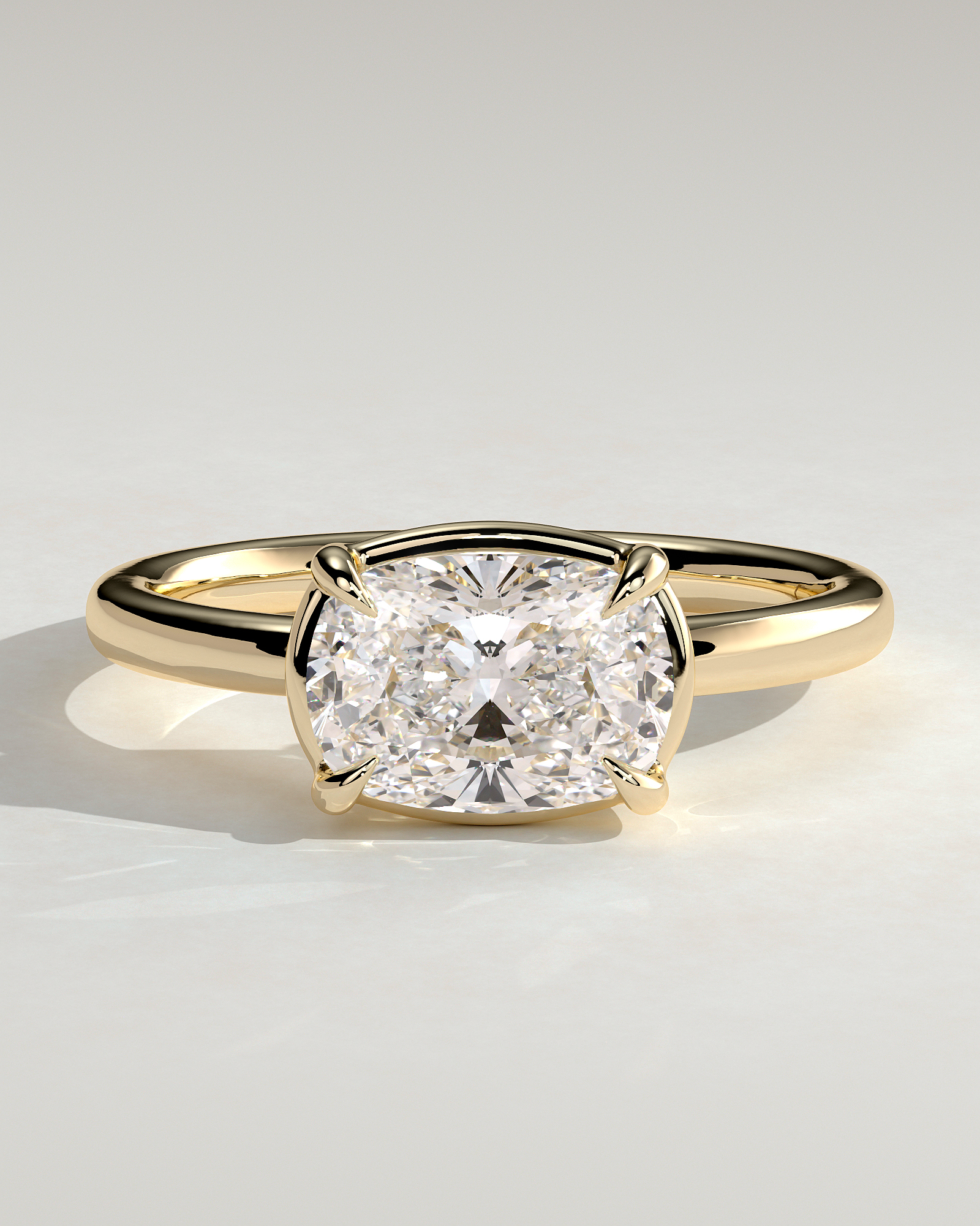 Daya - Elongated Cushion East West Bezel Frame Solitaire with Claws - 18k Yellow Gold