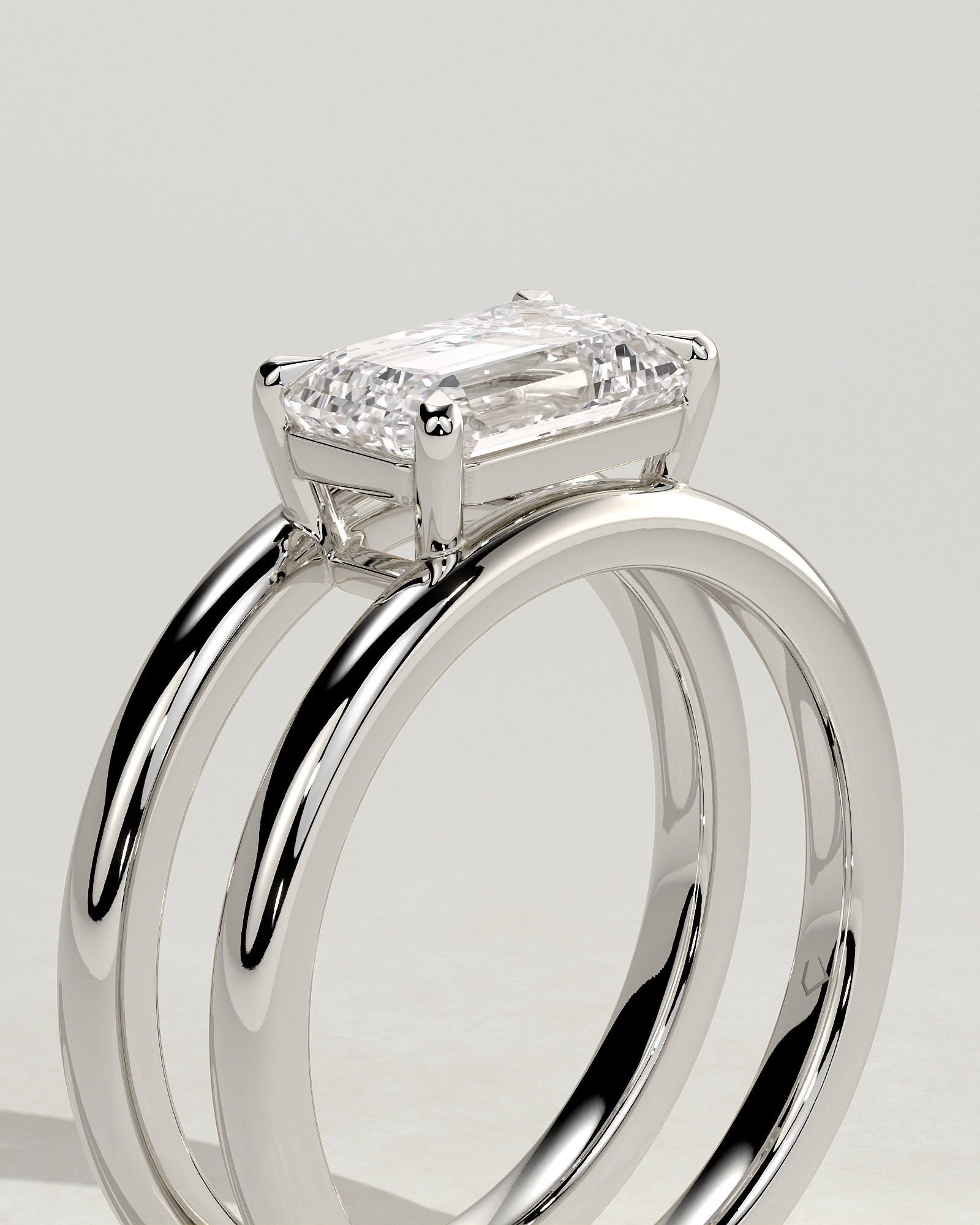Devon - Emerald Solitaire with Double Band - 18k White Gold