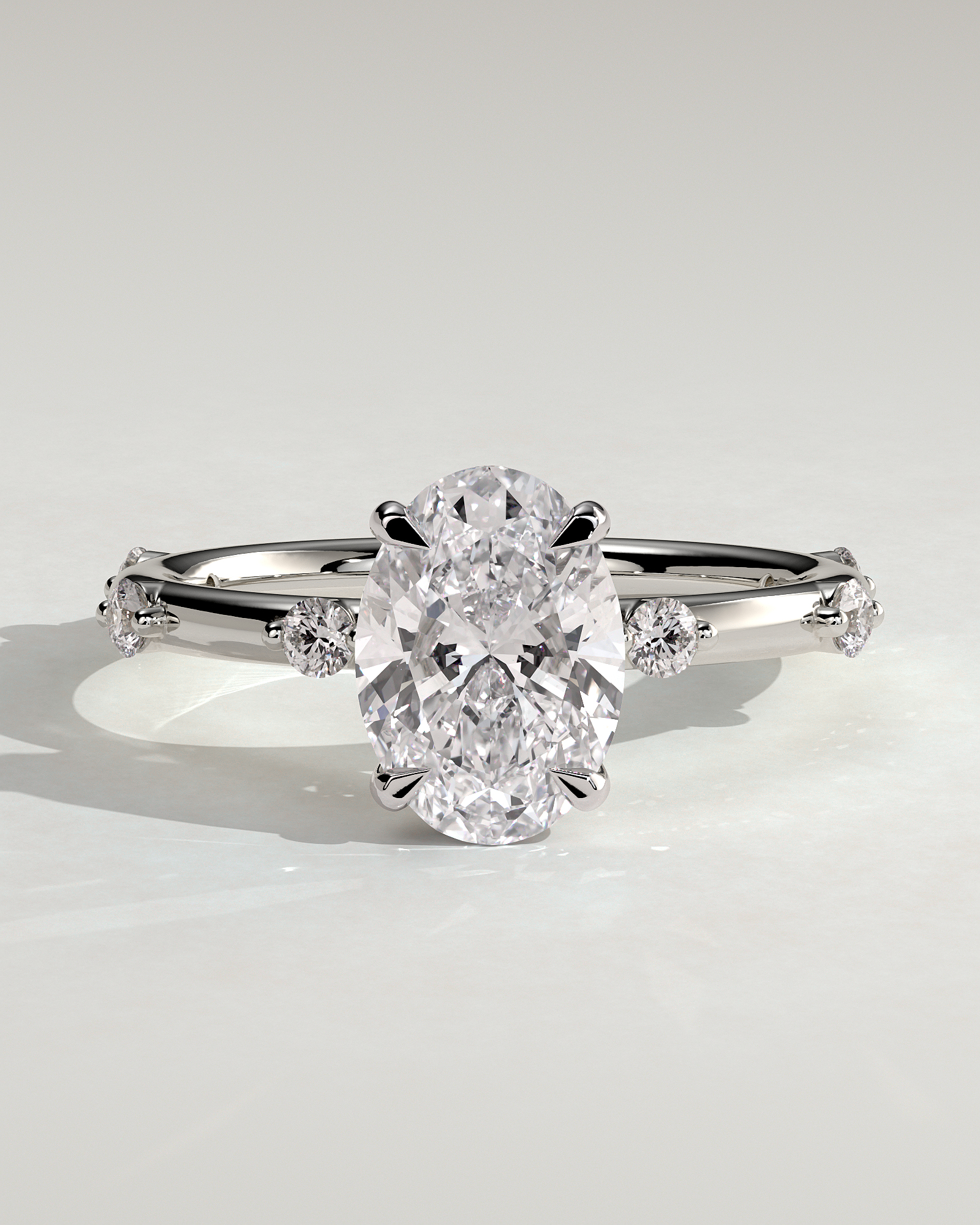Elise  Oval Solitaire with Hidden Halo and Accent Stones - 18k White Gold