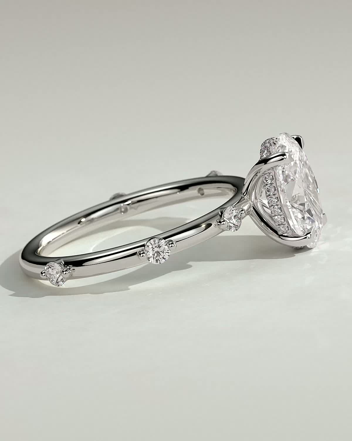 Elise  Oval Solitaire with Hidden Halo and Accent Stones - 18k White Gold