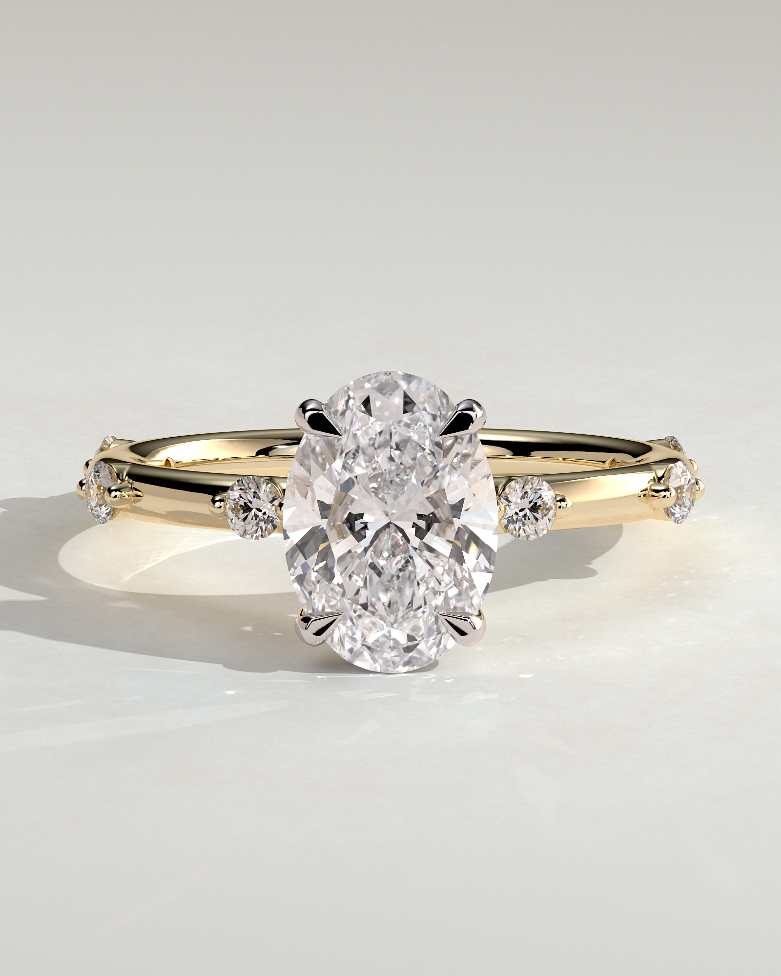 Elise  Oval Solitaire with Hidden Halo and Accent Stones - 18k Yellow Gold / 18k White Gold