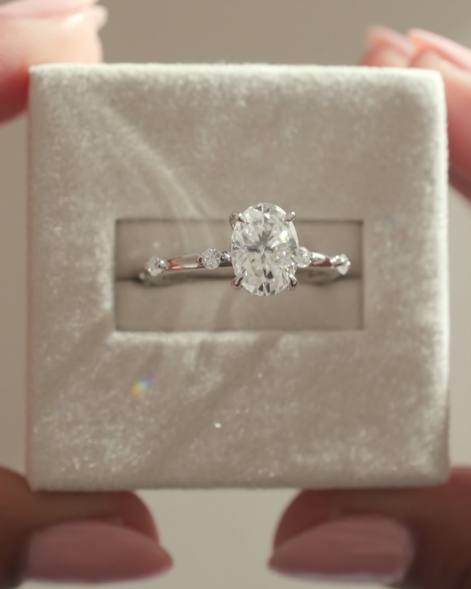 Elise  Oval Solitaire with Hidden Halo and Accent Stones Lifestyle Image