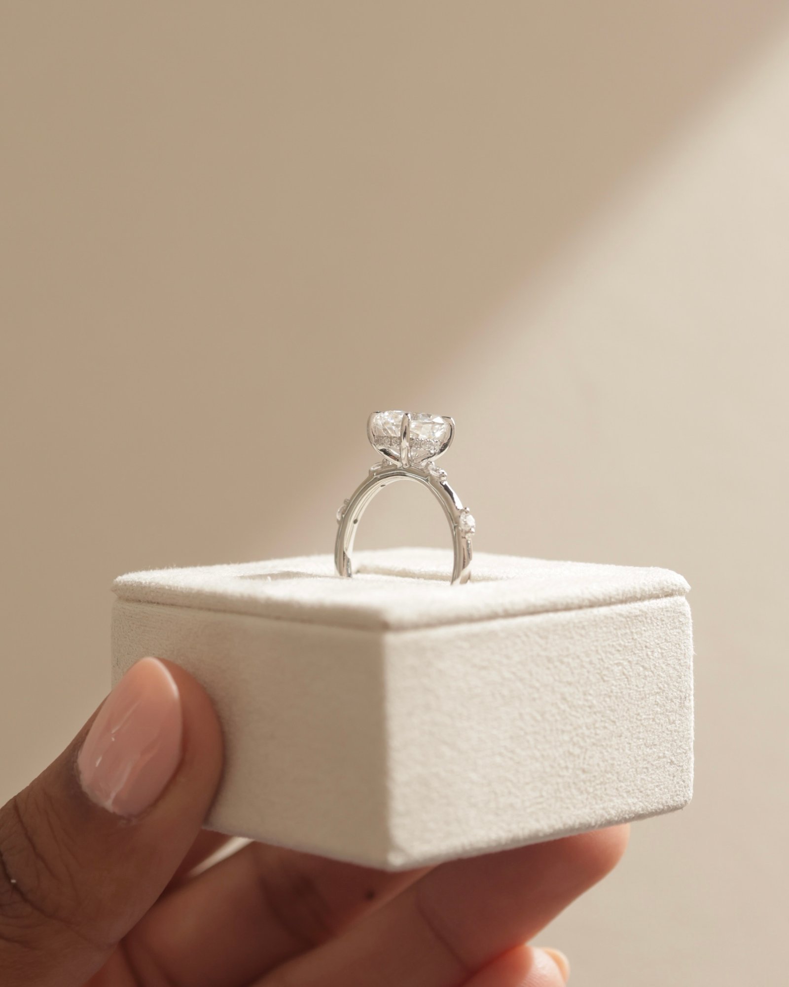 Elise  Oval Solitaire with Hidden Halo and Accent Stones Lifestyle Image