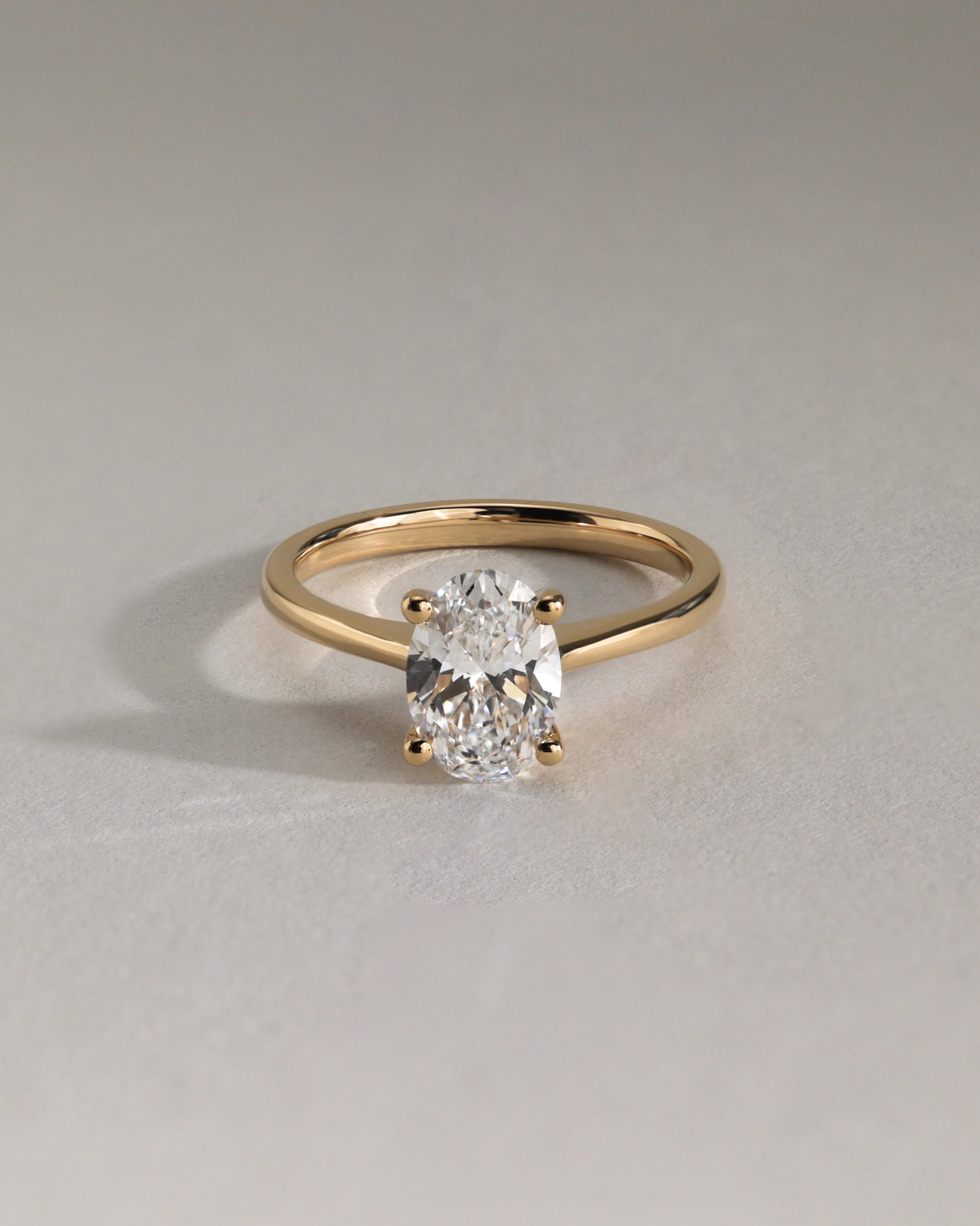 Emily - Oval Solitaire with Tapered Band Lifestyle Image