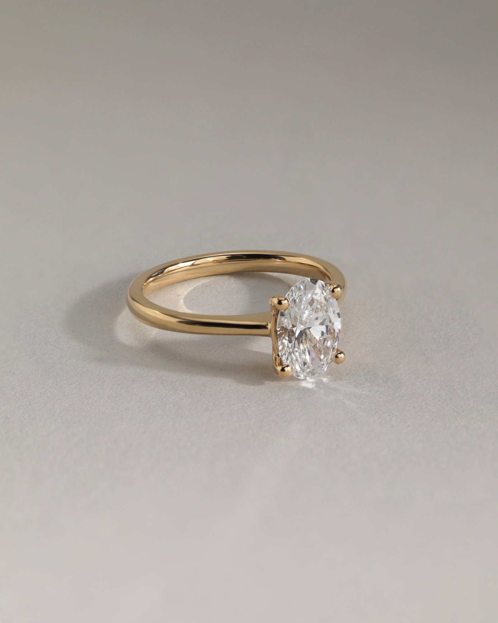 Emily - Oval Solitaire with Tapered Band Lifestyle Image