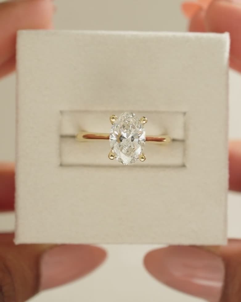 Emily - Oval Solitaire with Tapered Band Lifestyle Image