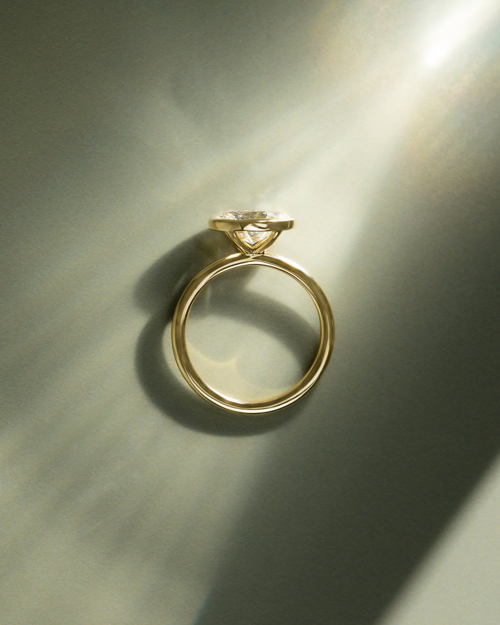 Erin - Bezel Oval East-West Solitaire Lifestyle Image