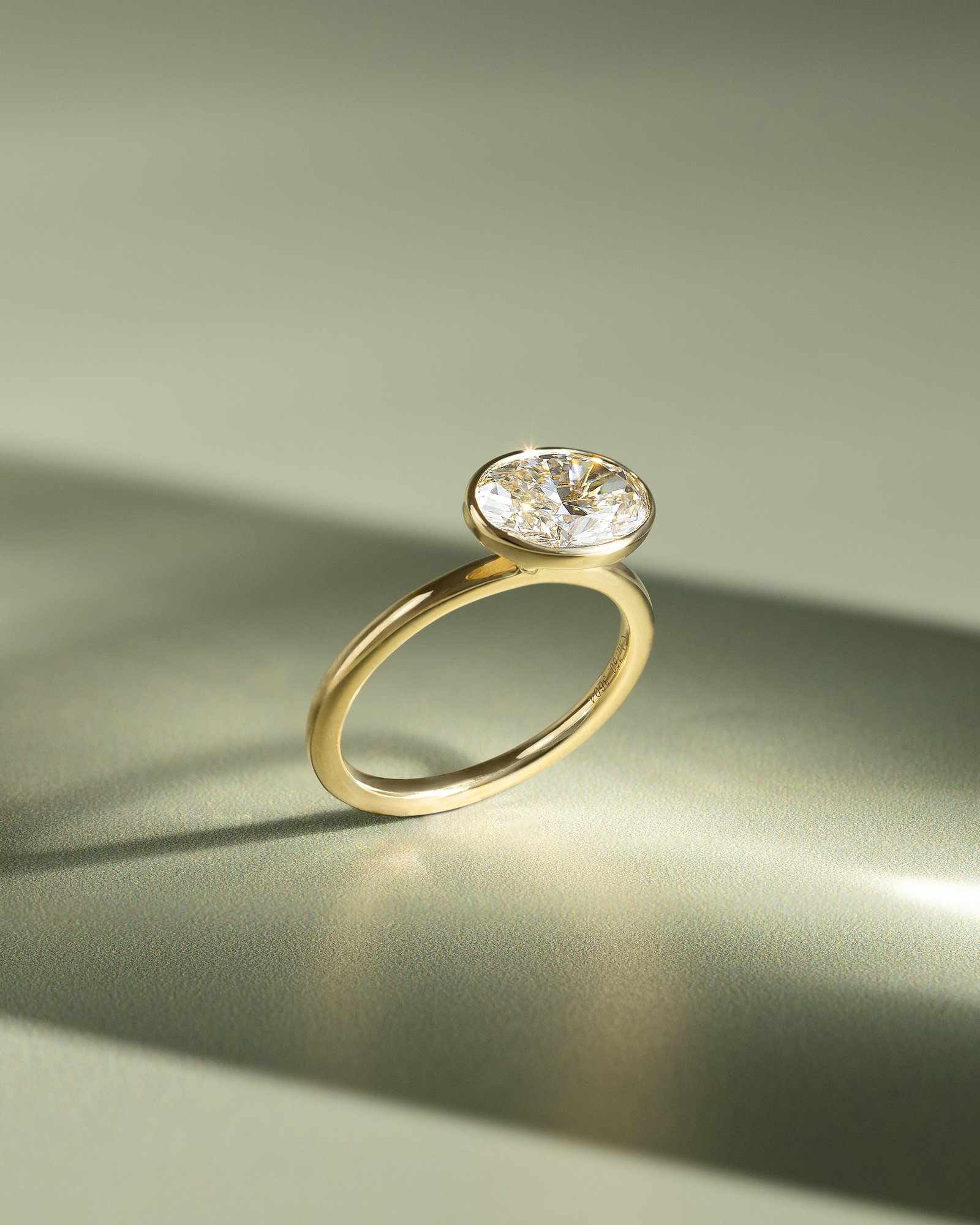 Erin - Bezel Oval East-West Solitaire Lifestyle Image
