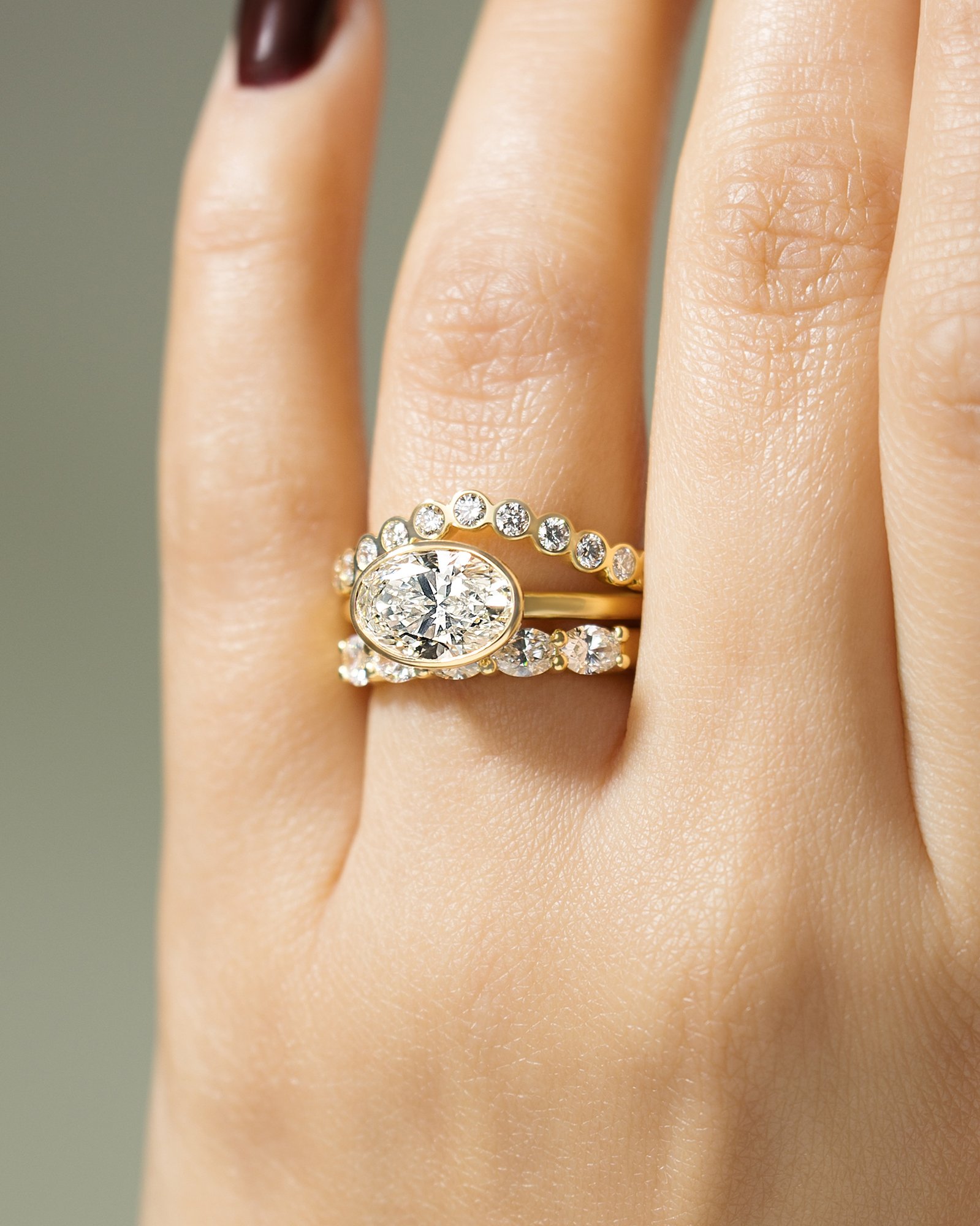 Erin - Bezel Oval East-West Solitaire Lifestyle Image