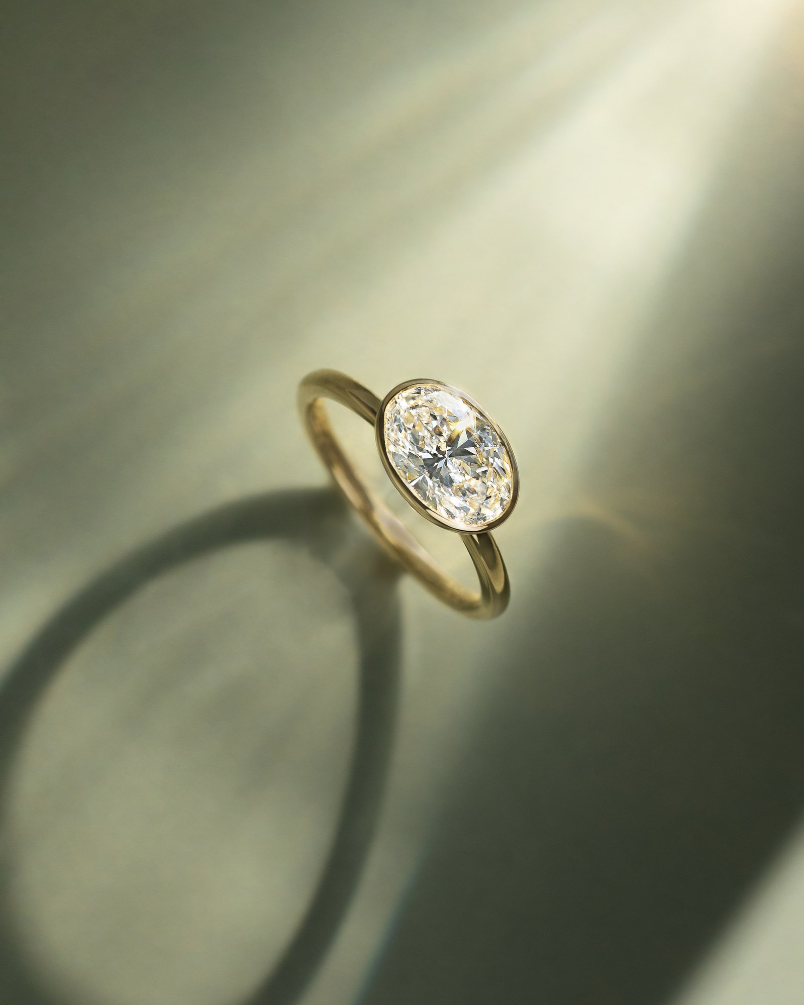 Erin - Bezel Oval East-West Solitaire Lifestyle Image